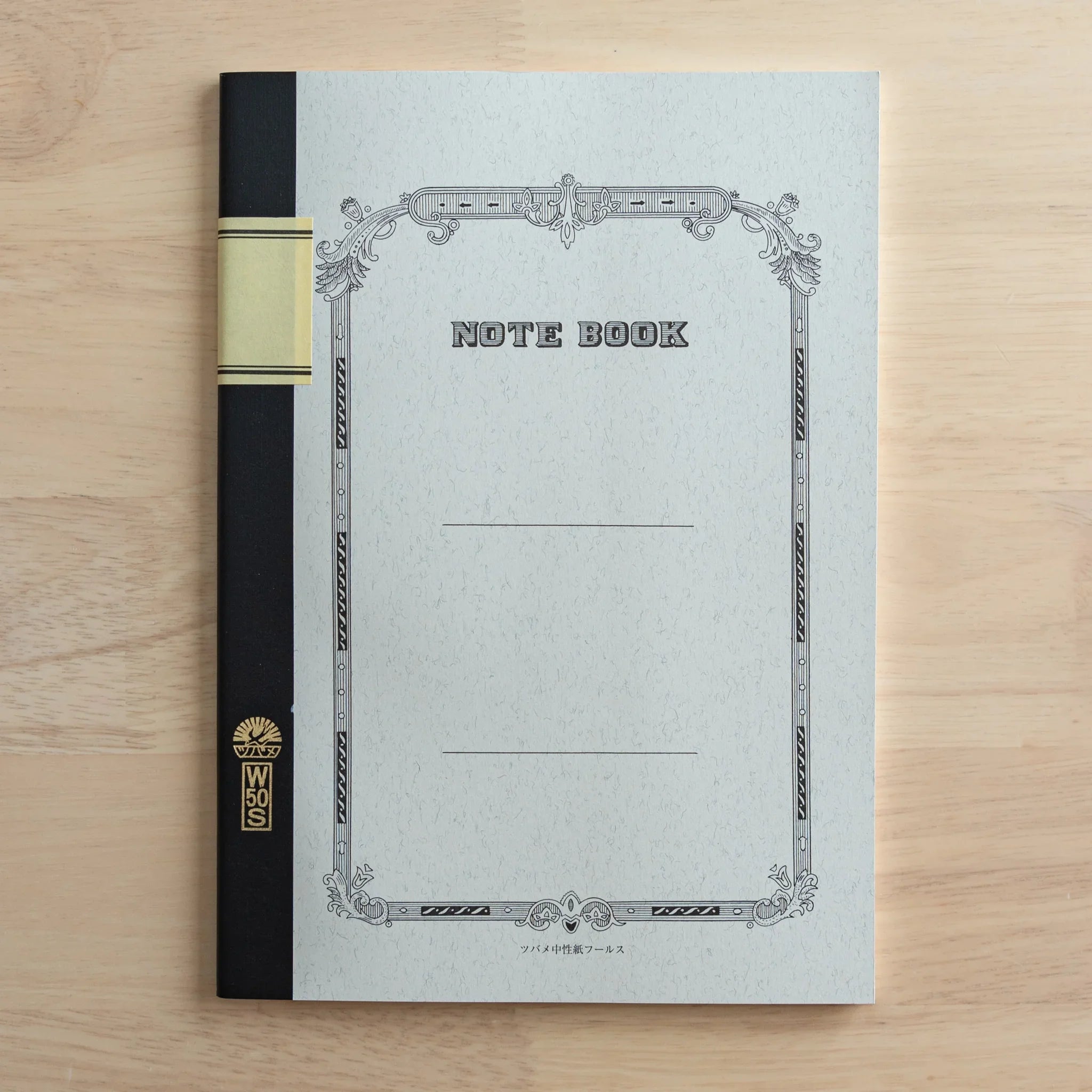 Interior detail showing page numbering, cream paper texture and fine ruling suitable for fountain pen writing