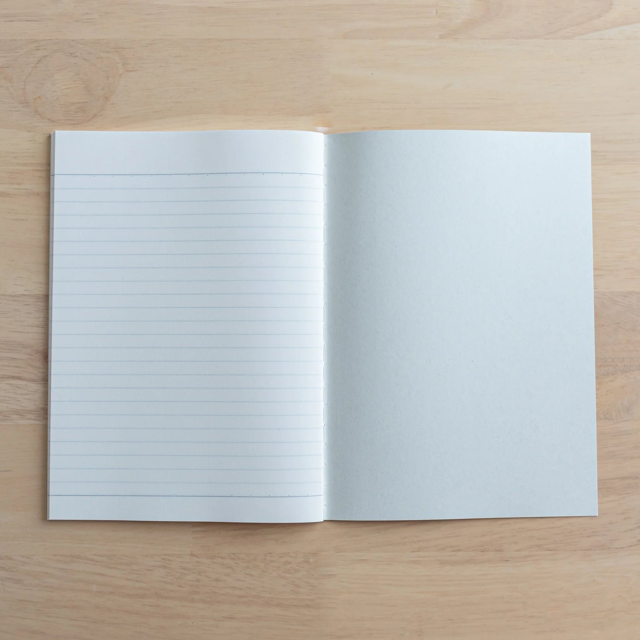 Tsubame Fools University Notebook back cover detail showing Japanese text information production complete