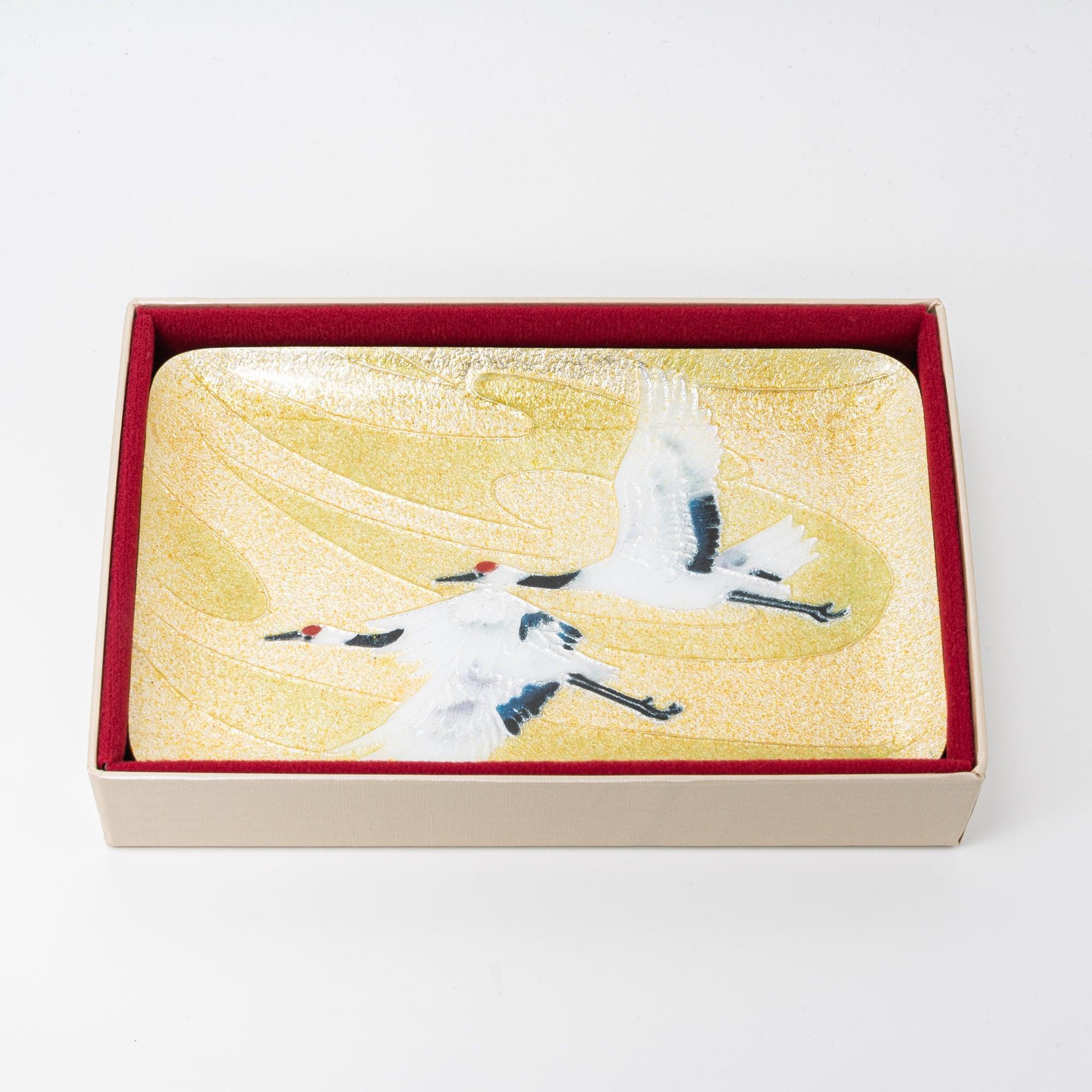Japanese shippo ware pen tray with twin cranes on gold resting inside cream gift box with red velvet lining