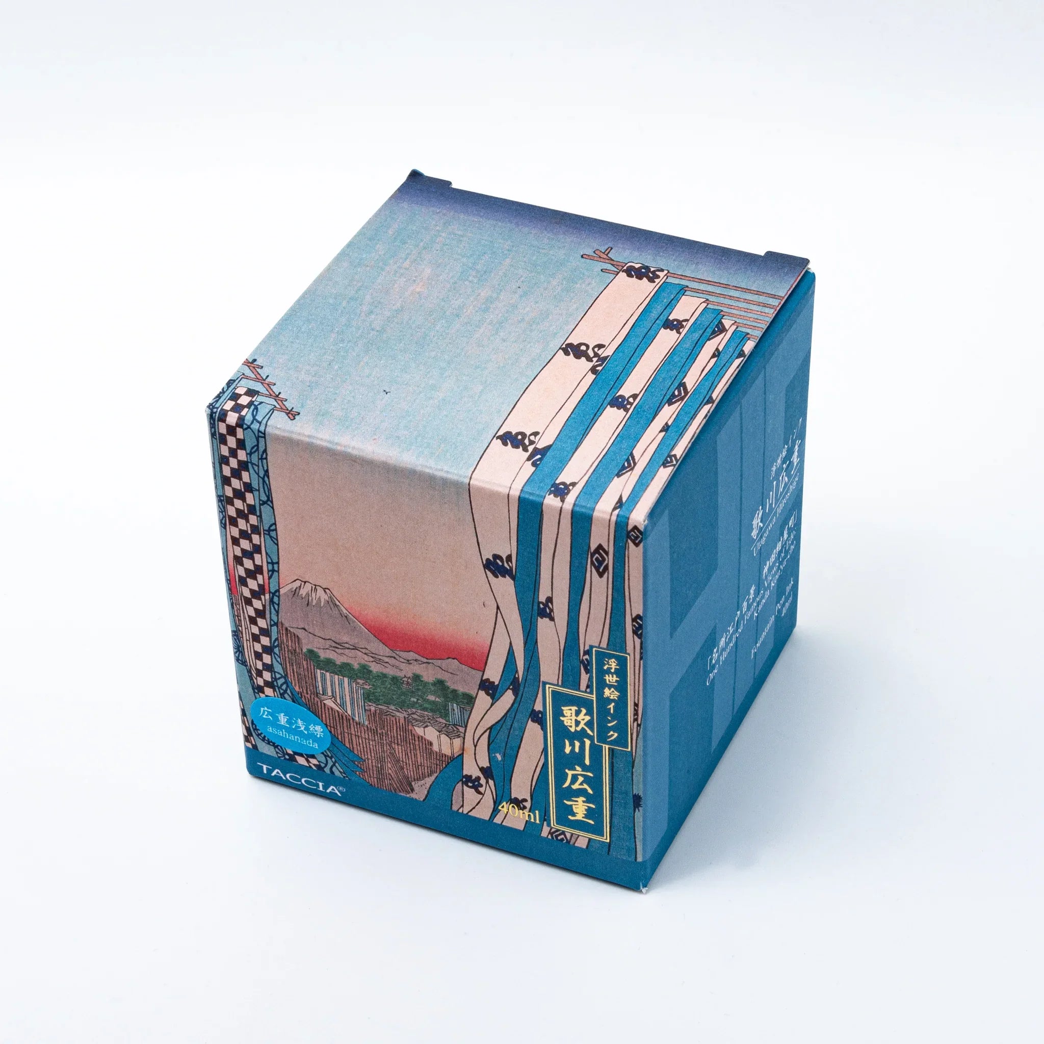 TACCIA Hiroshige Asahanada box angled view showing full Japanese landscape ukiyo-e design and gold text on neutral surface