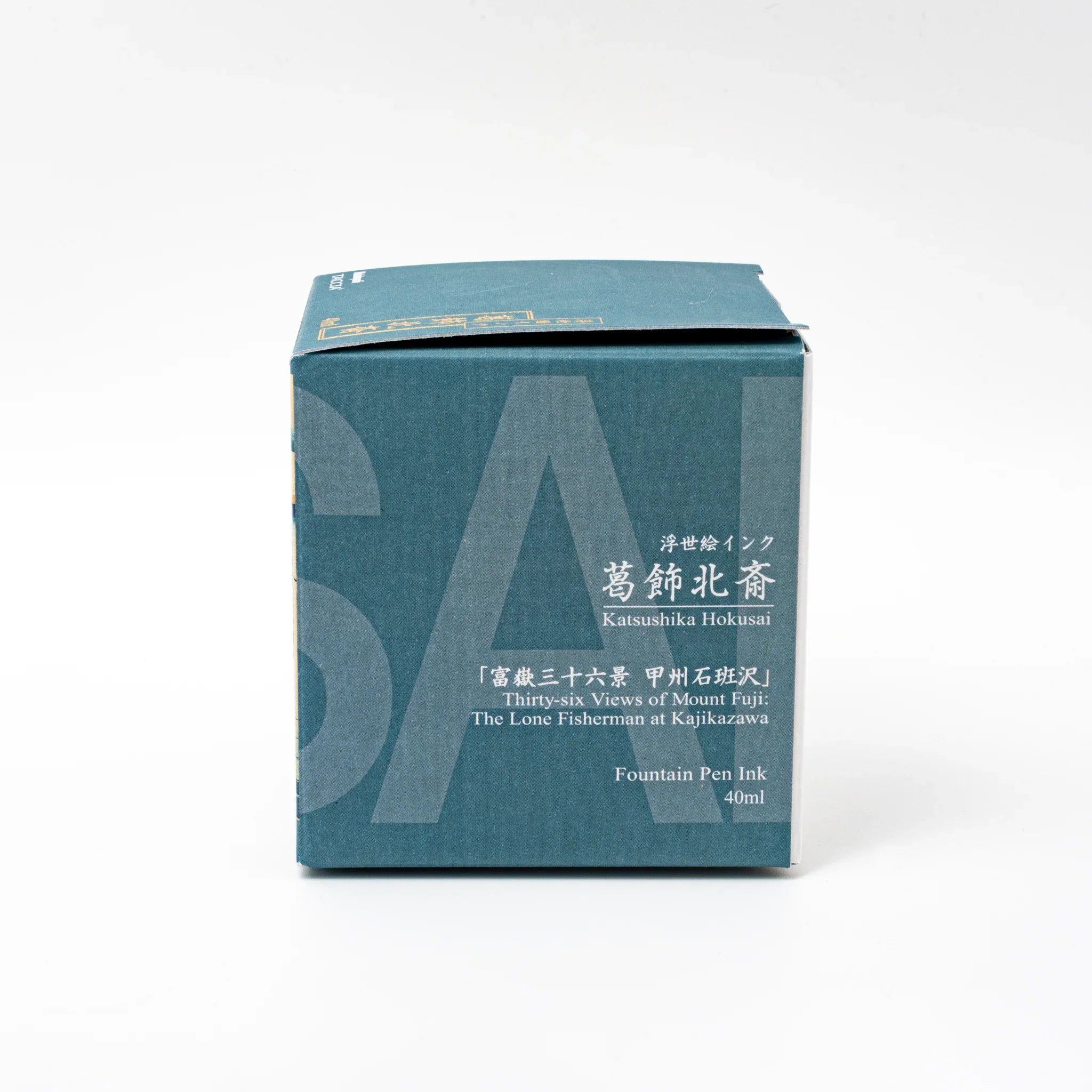 TACCIA Fukakihanada ink bottle showing rich sky blue color with mountain landscape artwork on decorative box detail