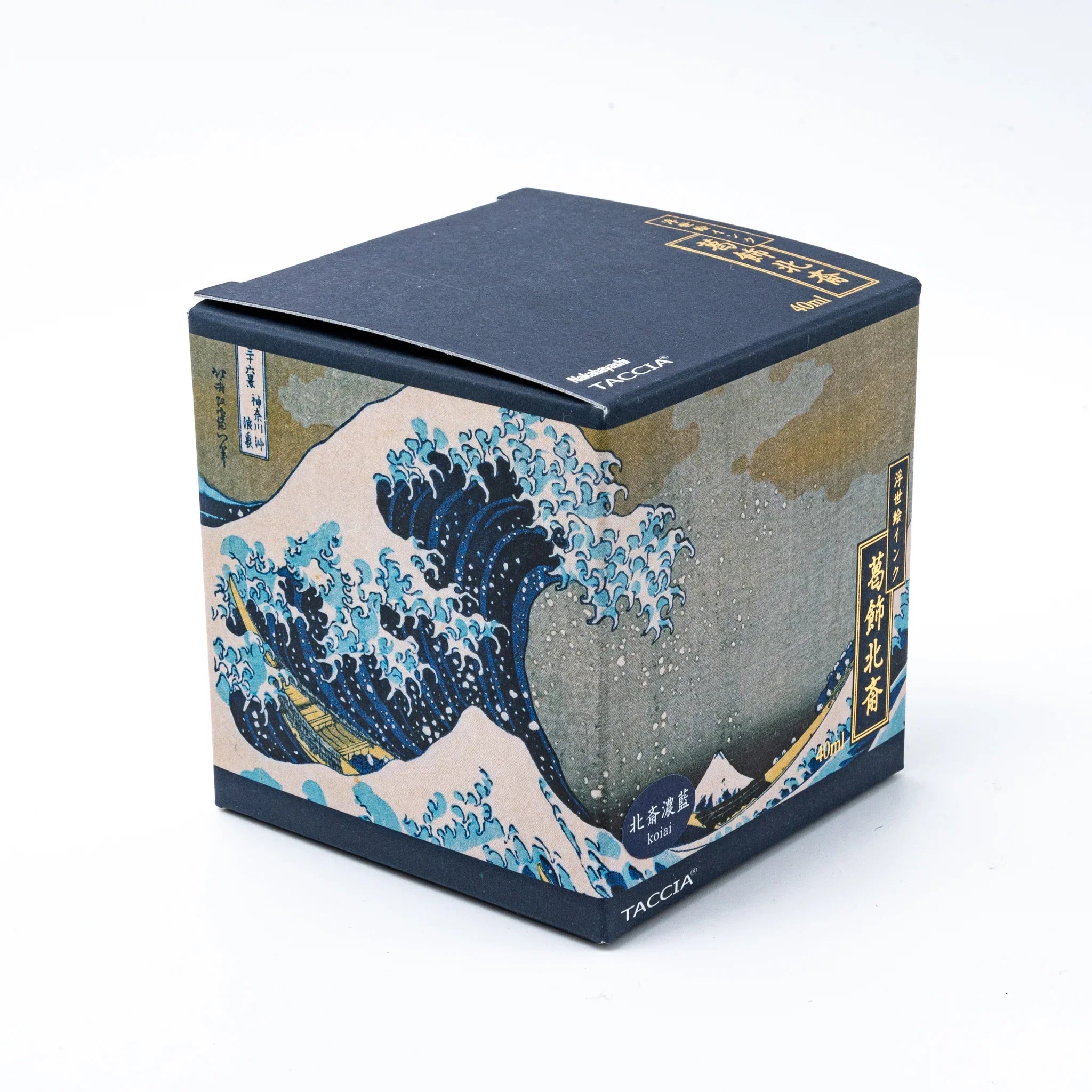 TACCIA Hokusai-koiai fountain pen ink bottle showing dark blue sample and complete product with Japanese woodblock box