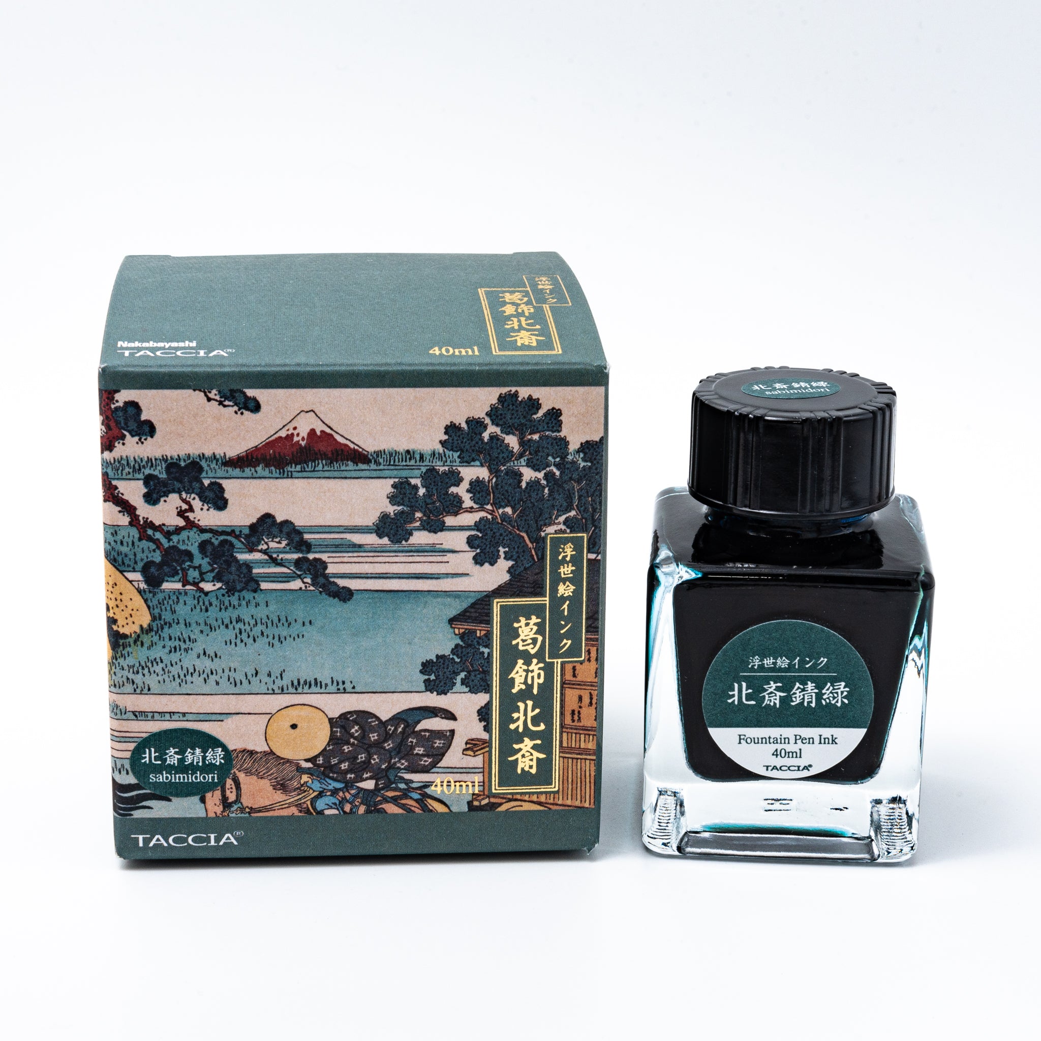Japanese stationery fountain pen ink. The packaging features Ukiyo-e style art of a rural landscape with Mount Fuji. The glass bottle contains 40ml of teal "Sabimidori" ink.