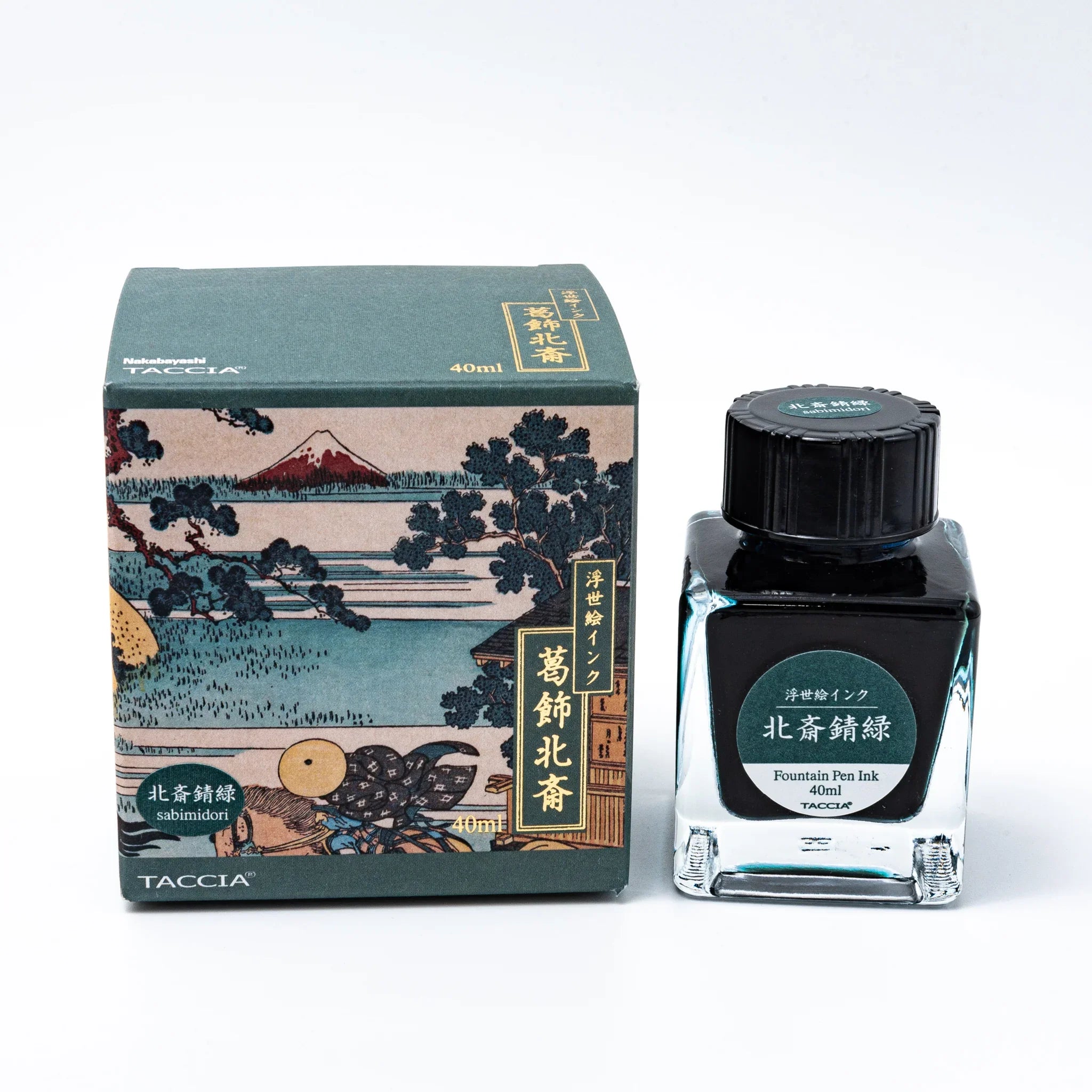 TACCIA Hokusai sabimidori fountain pen ink bottle with teal liquid and woodblock artwork box on white background display