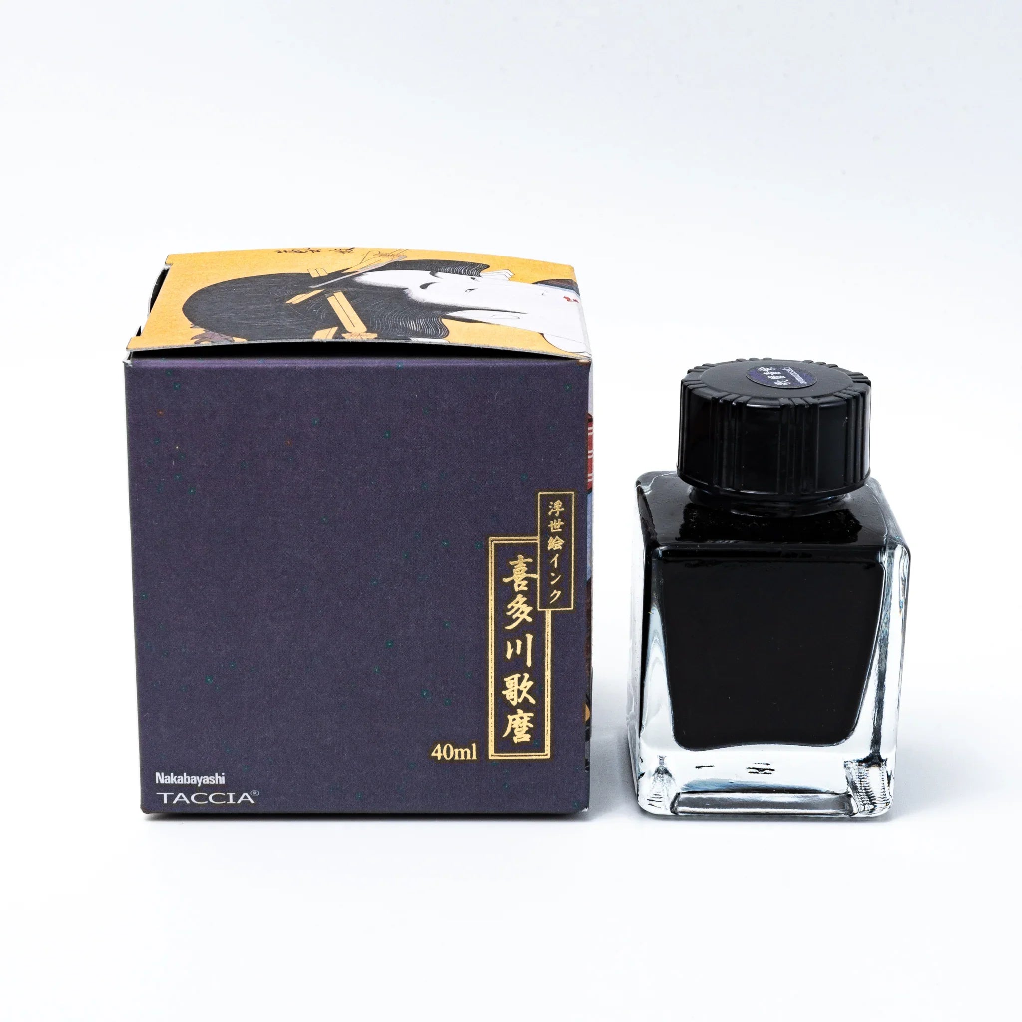 TACCIA Utamaro-aomurasaki ink box and glass bottle set at three-quarter angle showing complete product packaging