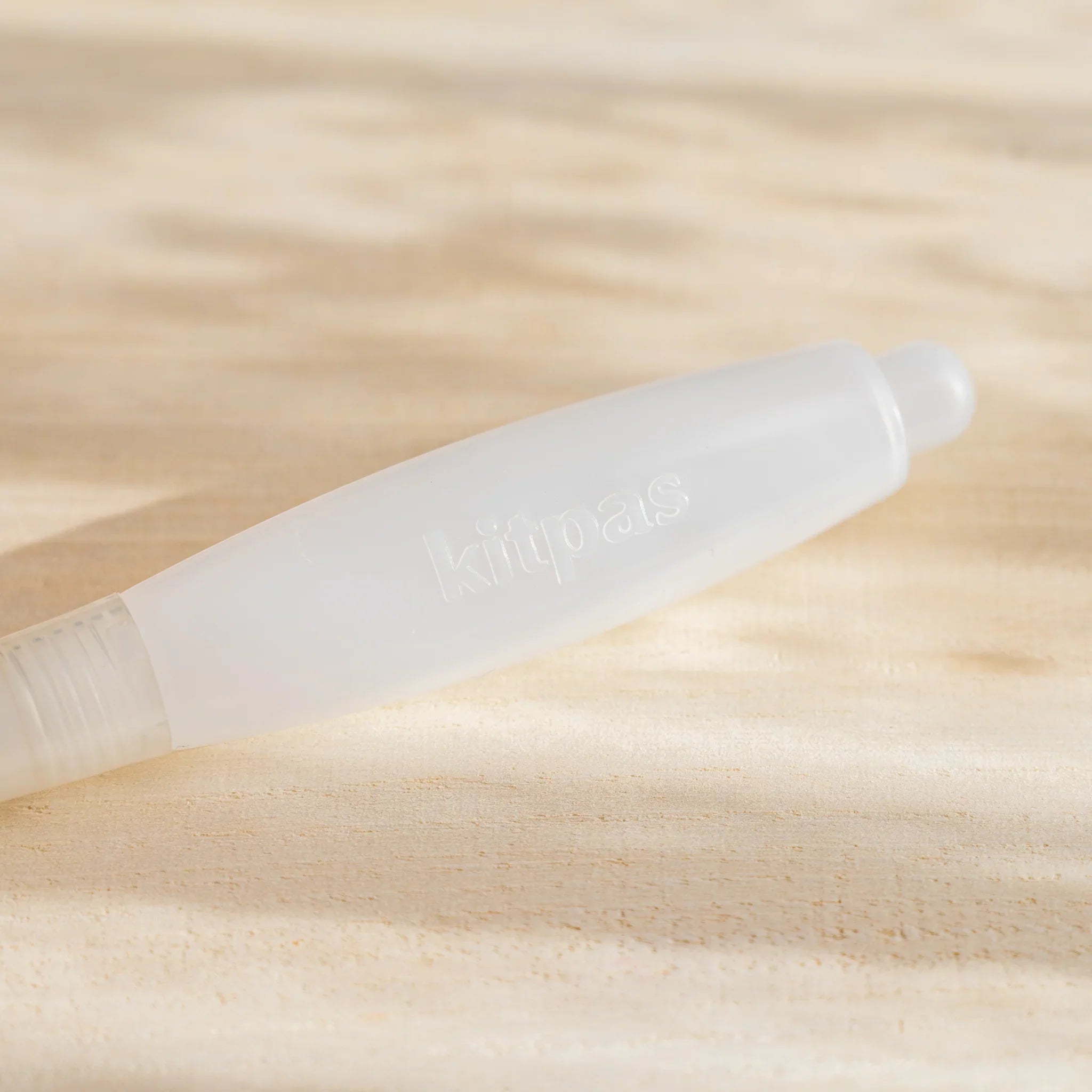 Packaged kitpas watercolor crayons water brush pen shown on a neutral background, designed for blending colors with water