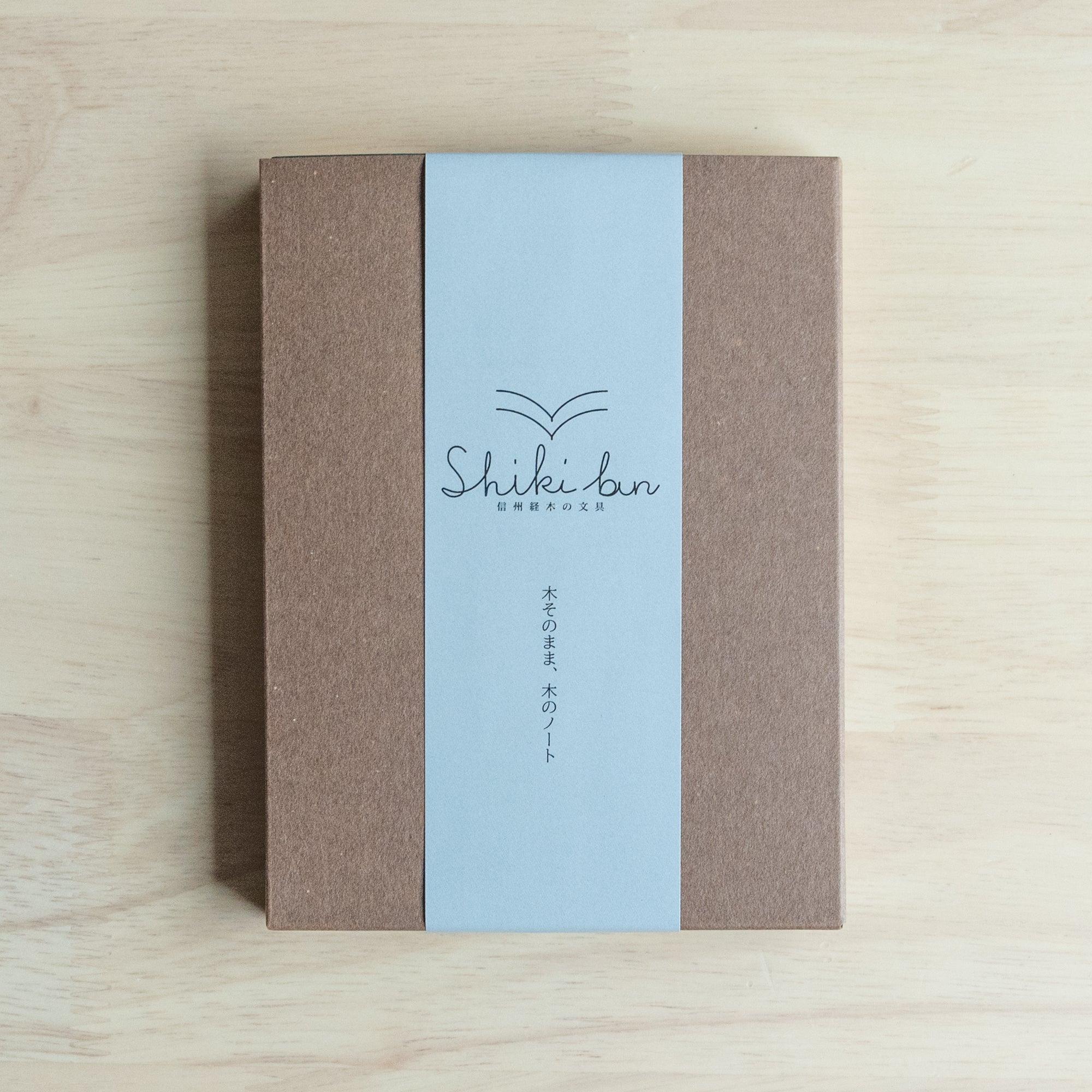 Wooden Page Notebook A6 packaging - Shiki-bun branded box containing 100 red pine wood page notebook