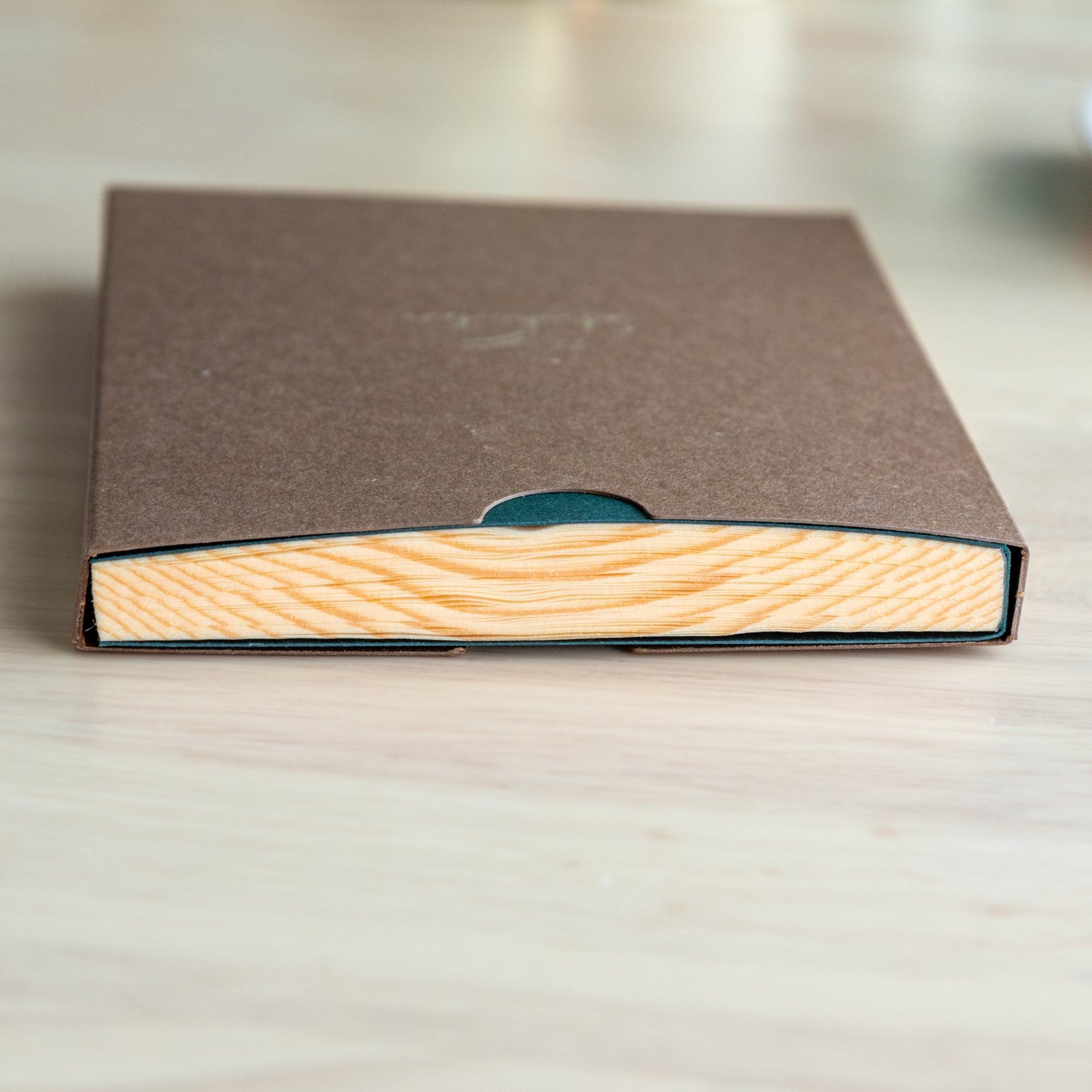 Side view of Wooden Page A6 Notebook showing natural red pine wood grain texture - Japanese craftsmanship