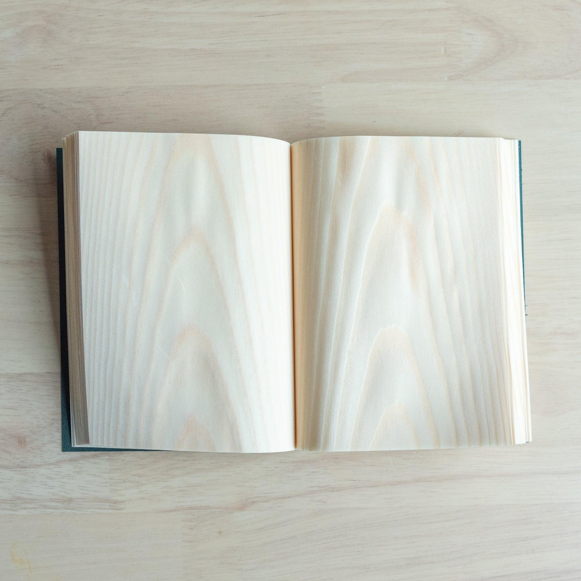 Wooden Page Notebook A6 open showing natural red pine wood grain pages - unique Japanese stationery material