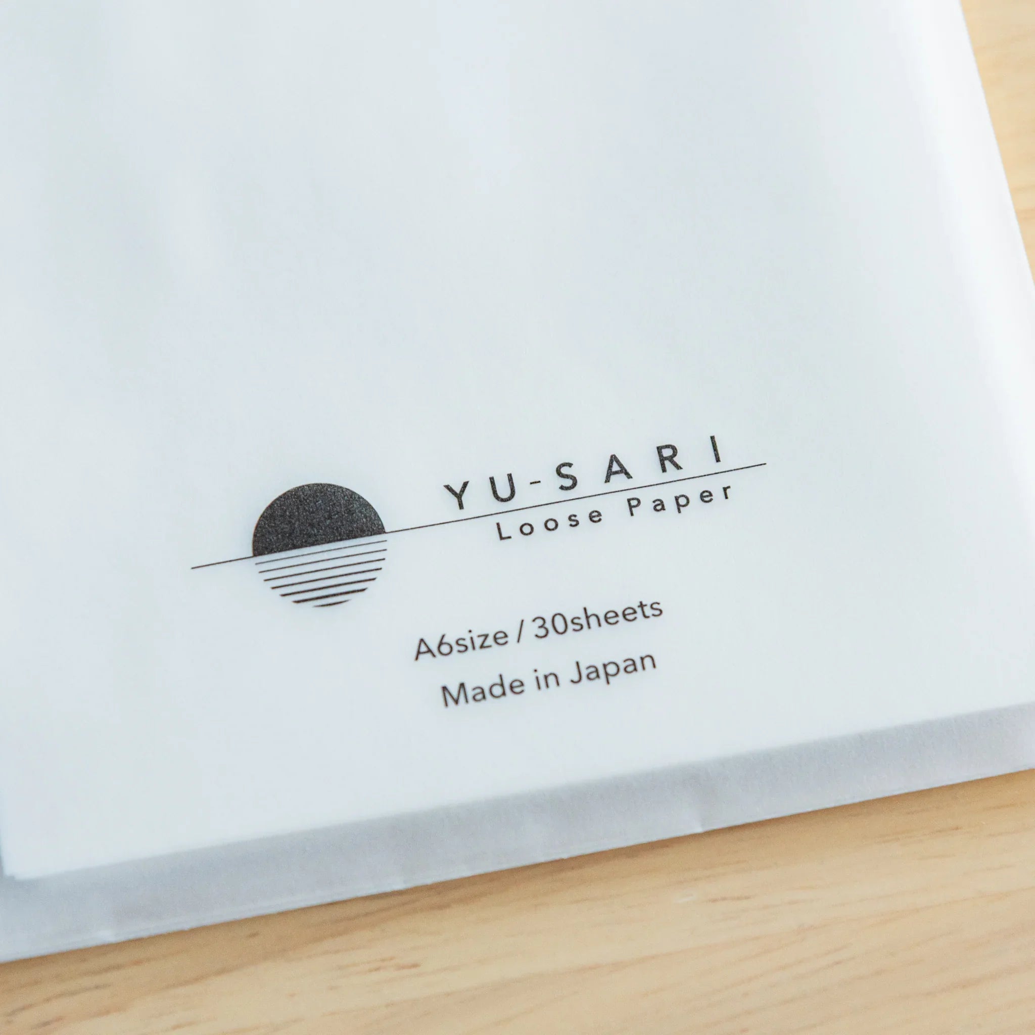 YU-SARI loose leaf paper packets arranged display showing multiple package sizes and Japanese branding presentation