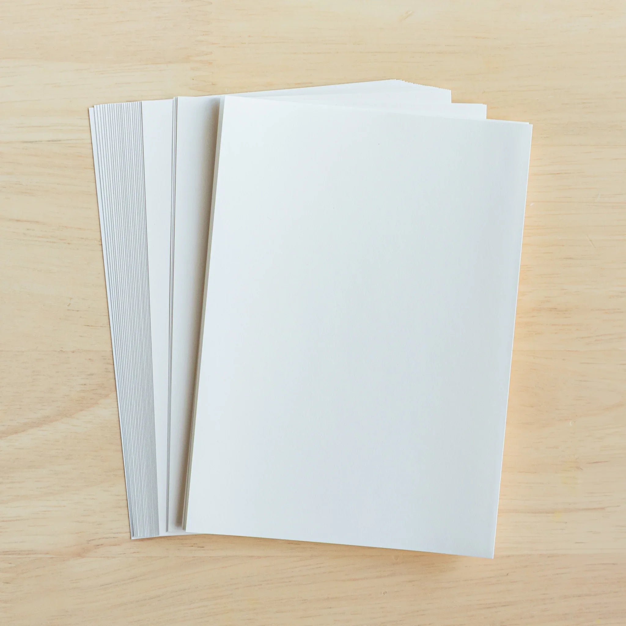 YU-SARI fountain pen paper white sheets photographed showing edge quality and paper brightness detail