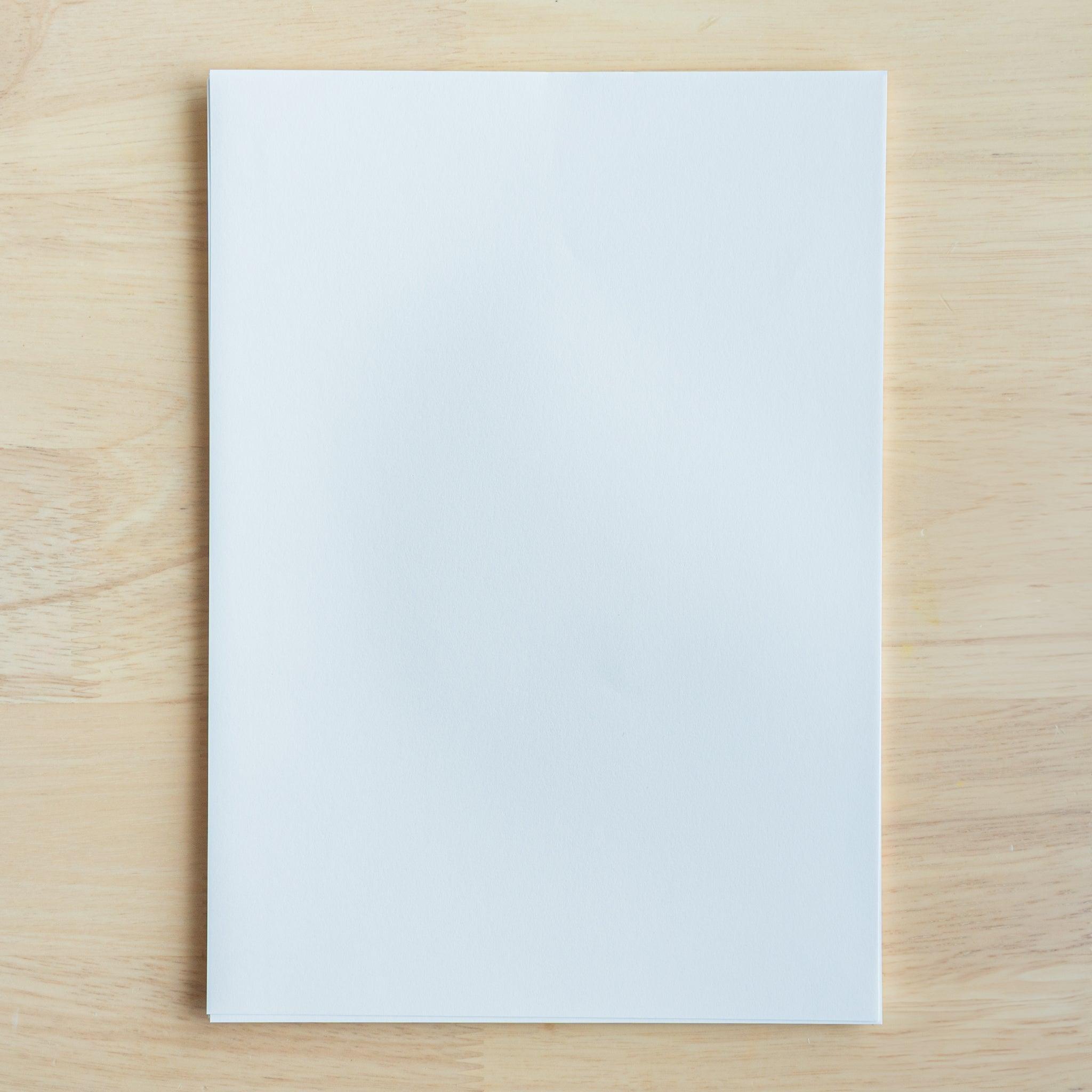 An image of YU-SARI Fountain Pen Loose Leaf Paper taken out of the package. The paper color is white. Japanese stationery.