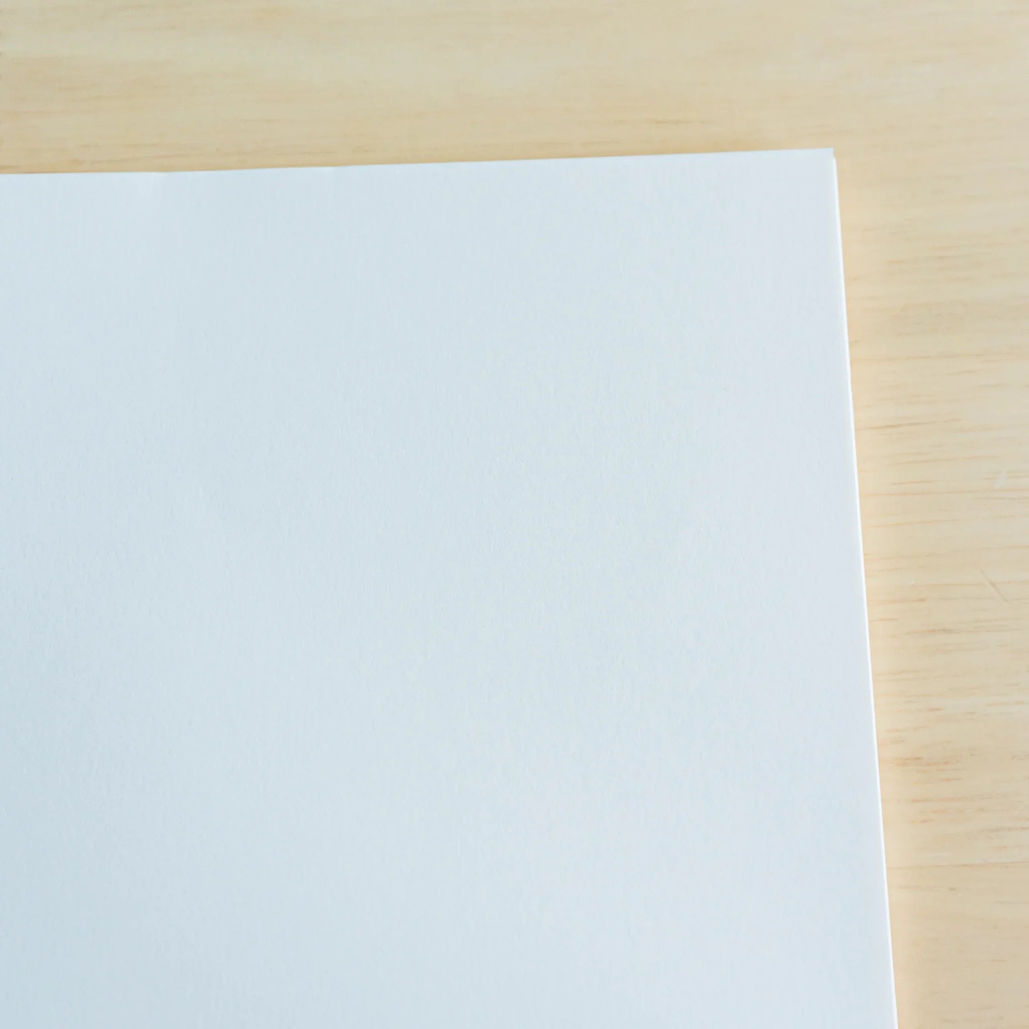 YU-SARI fountain pen loose leaf paper spread display showing multiple sheet sizes arranged with Japanese branding label