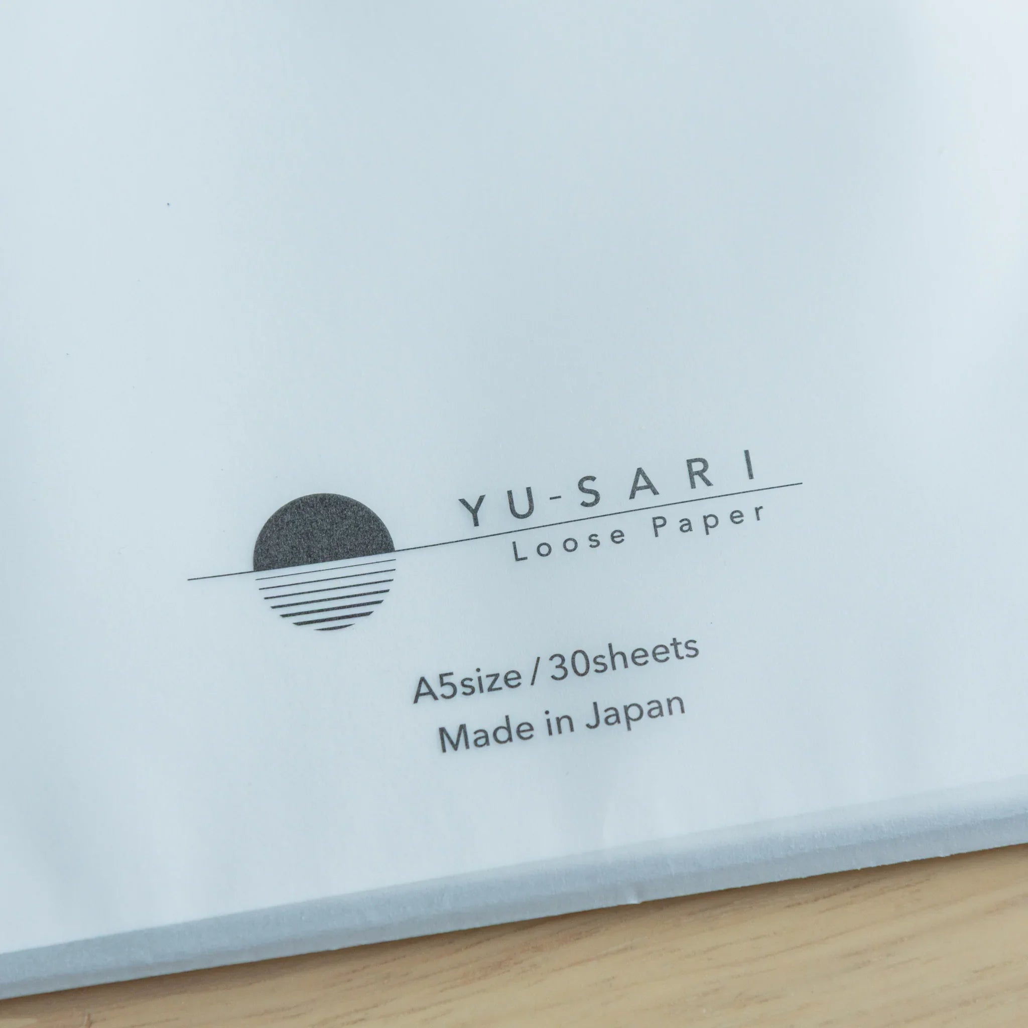 YU-SARI fountain pen loose leaf paper single sheet detail display showing writing surface quality and paper smoothness