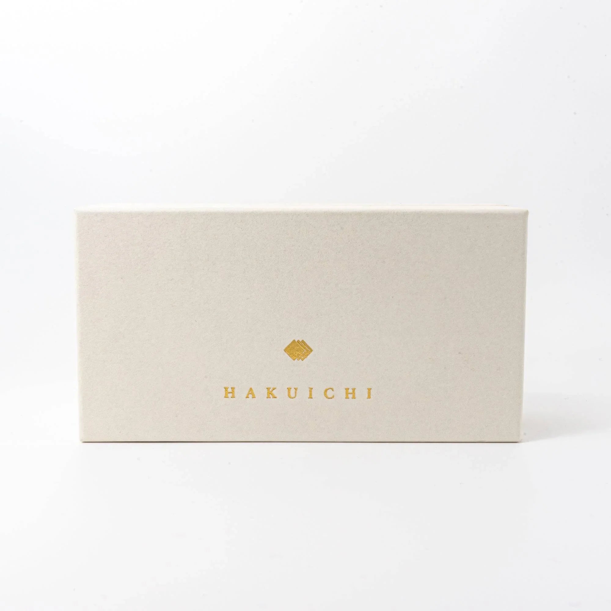 Single gold Japanese ceramic crane pen rest featuring intricate crackle-pattern finish and folded design