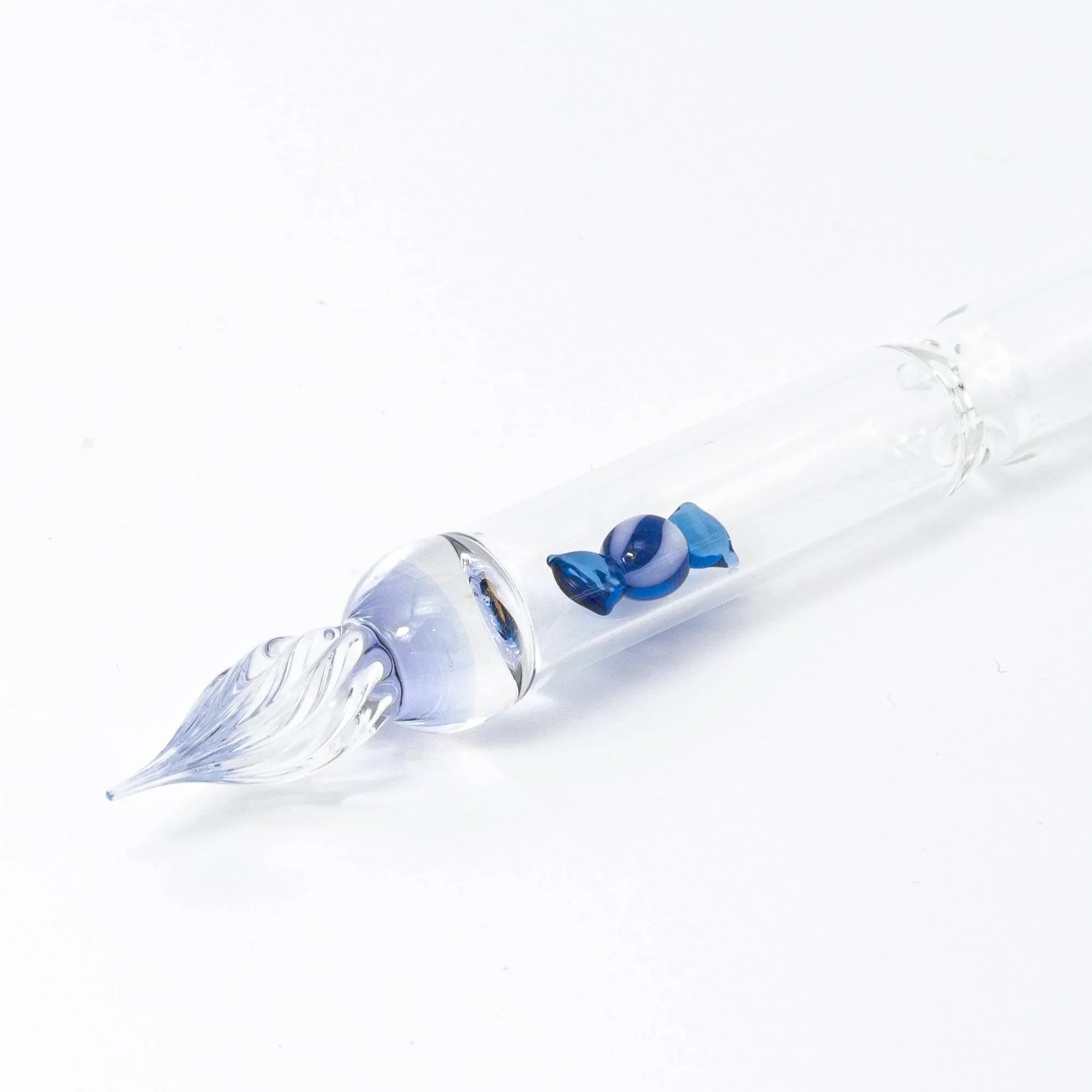 hand-made blue glass dip pen displaying trapped colorful candy bubble design elements within glass composition