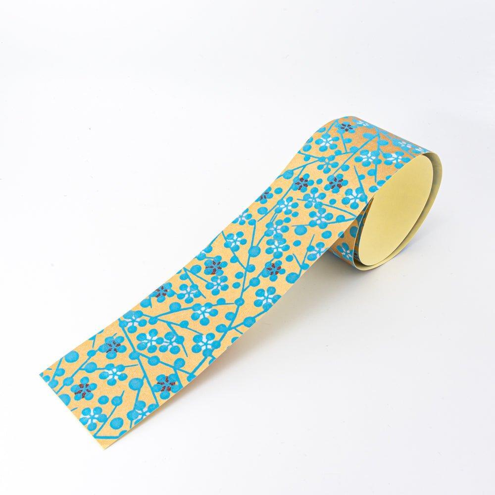 Blue Yuzen washi tape roll showing intricate hand-dyed floral pattern for decorative craft and gift wrapping