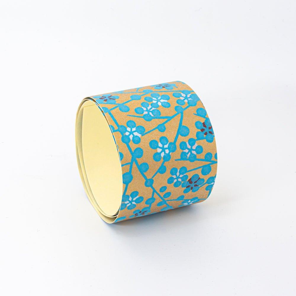 Close-up of hand-dyed blue flower washi tape showing detailed traditional flower dyeing pattern on paper