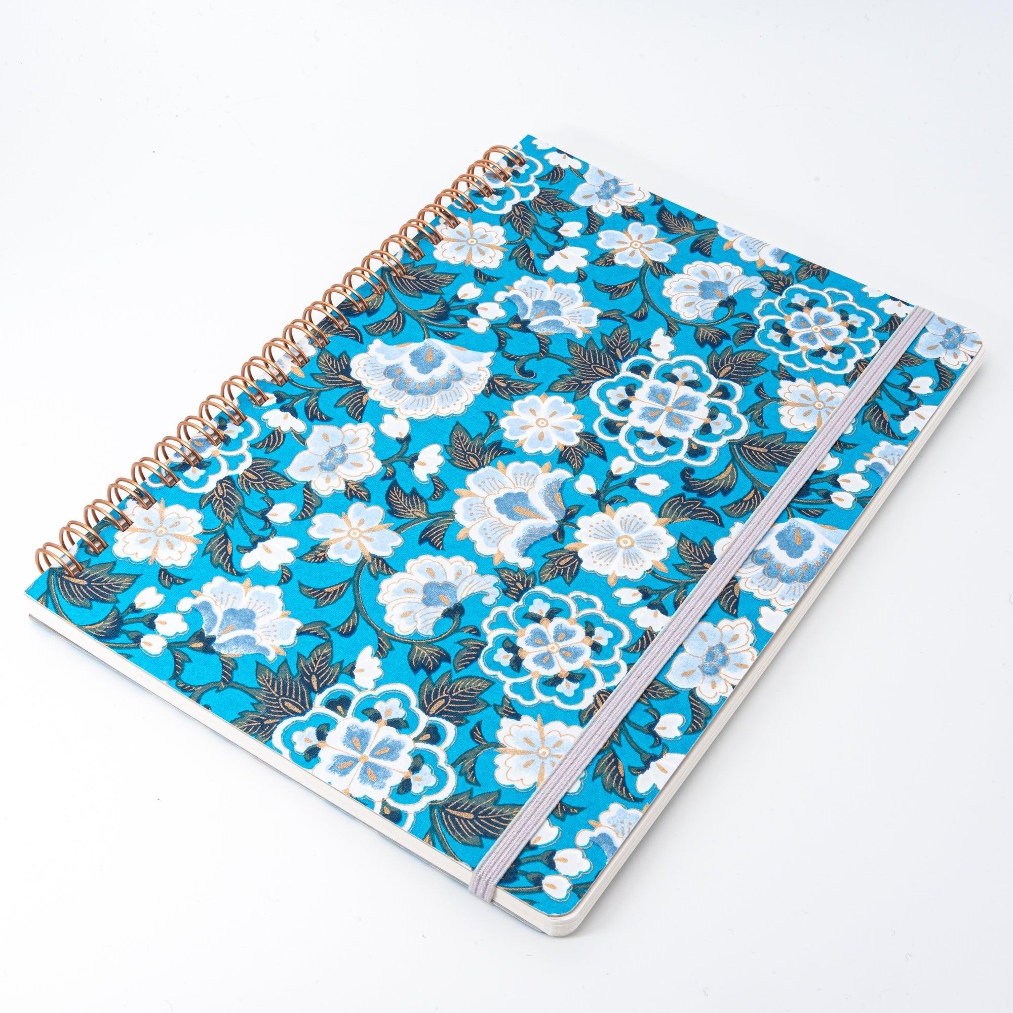 Yuzen washi notebook cover featuring blue garden hand-dye design showing intricate traditional pattern detail