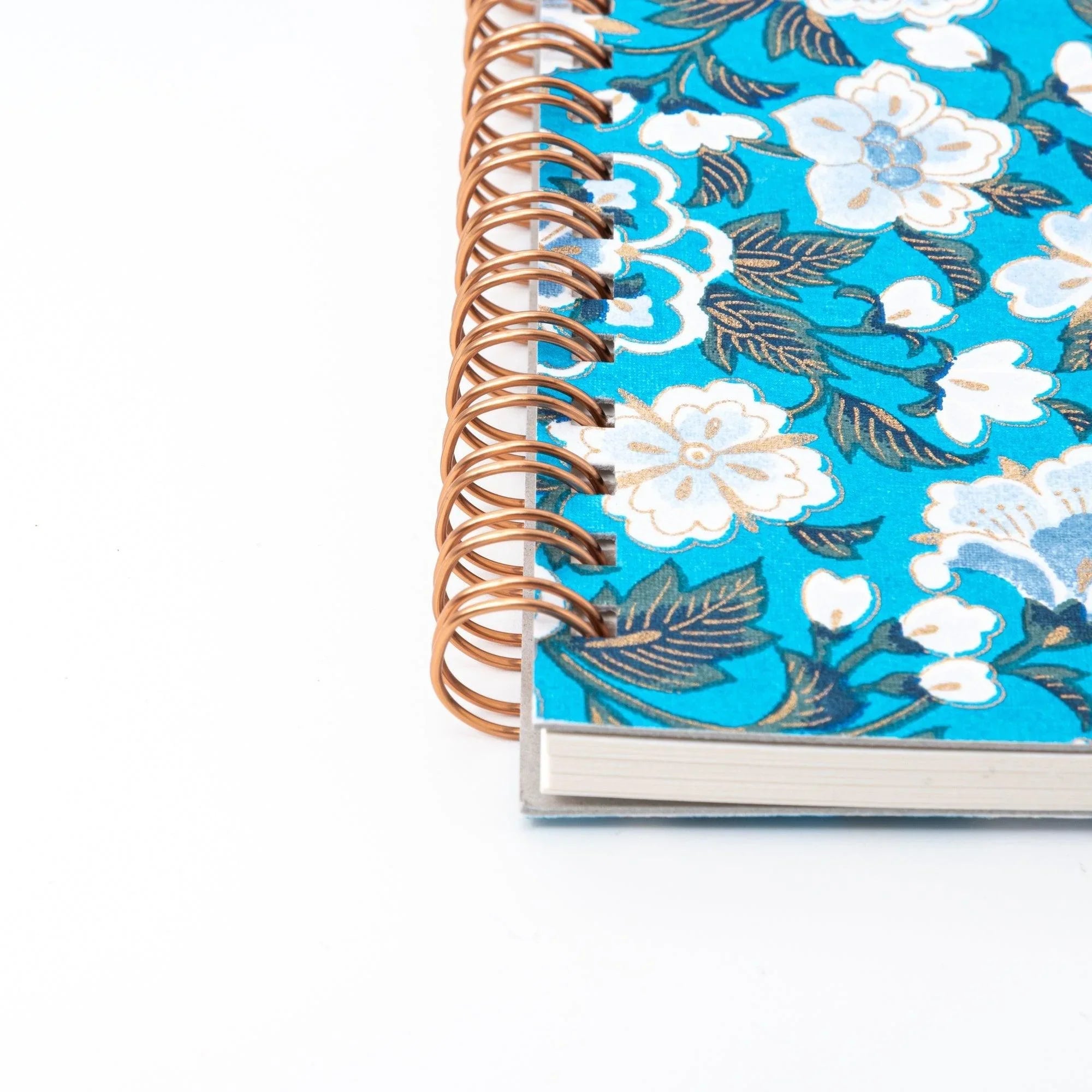 Blank writing pages inside blue garden washi spiral notebook showing paper quality and writing space