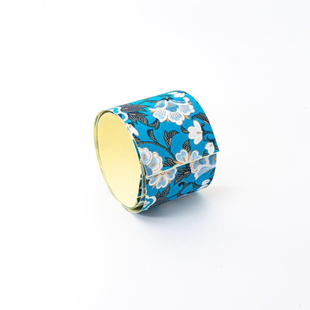 Close-up of hand-dyed blue garden washi tape showing detailed traditional garden flower dyeing pattern