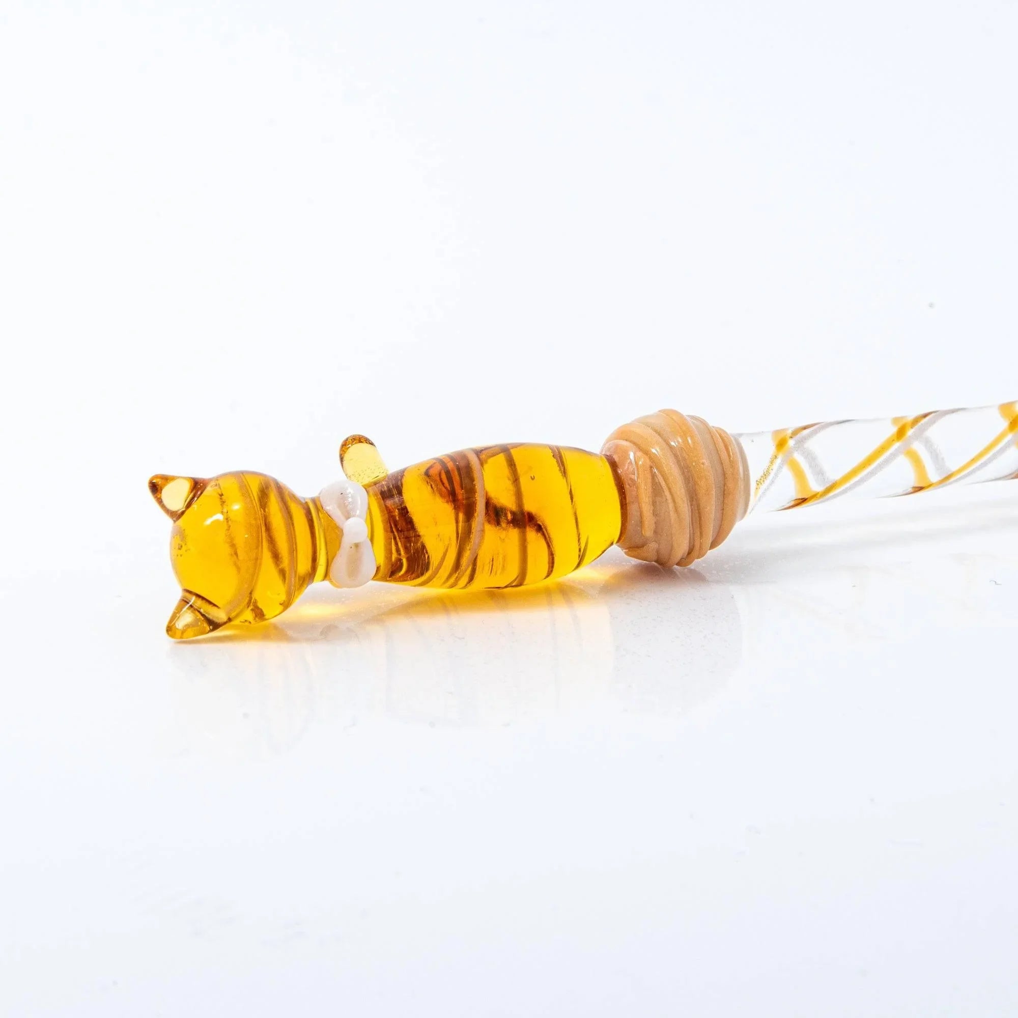 Brown Tabby Nyanko glass dip pen with yellow amber glass and brown tabby stripe pattern on white with handle detail and