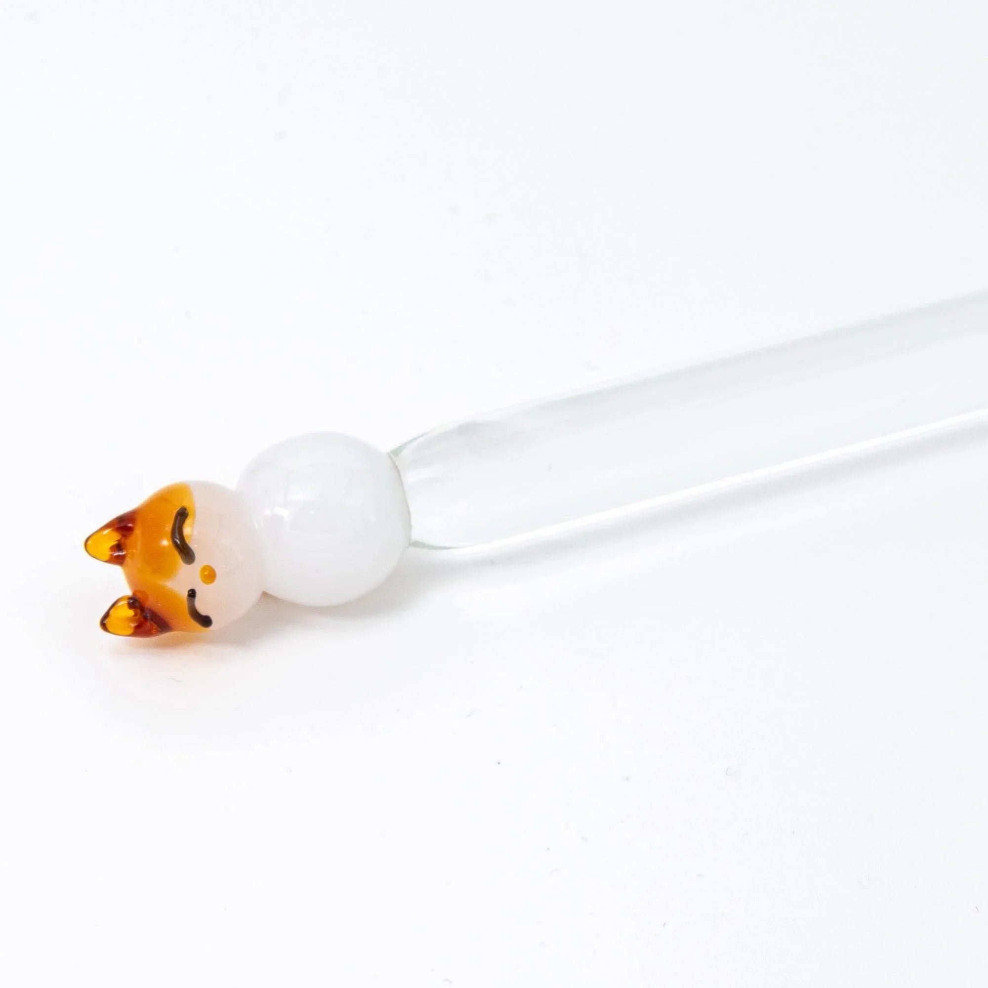 Cat-themed glass dip pen displaying Japanese cat ear design in profile with hand-made nib and glass with holder
