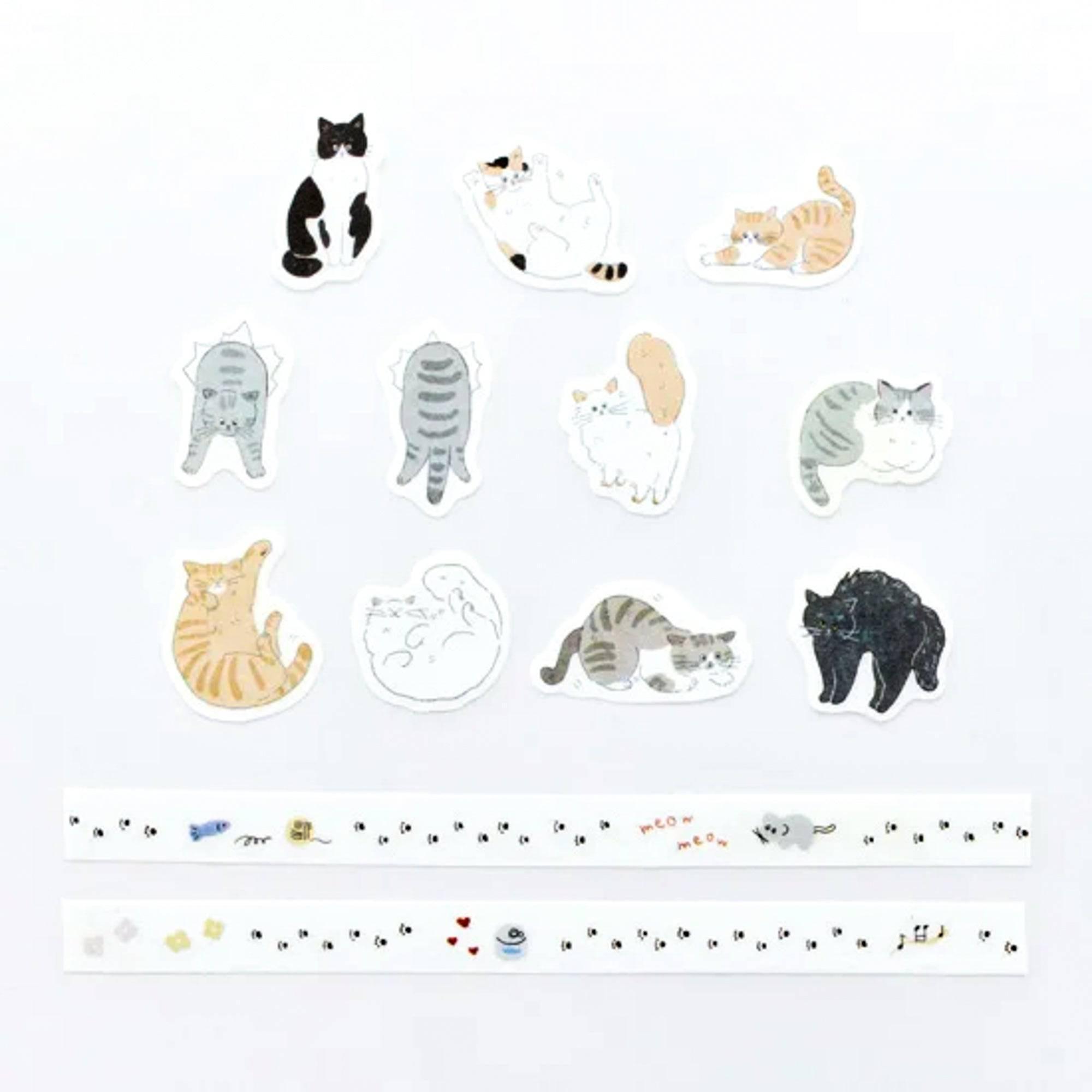 Sticker pieces of different cat illustrations, including lounging, stretching, and sitting poses, neatly arranged on a white surface.