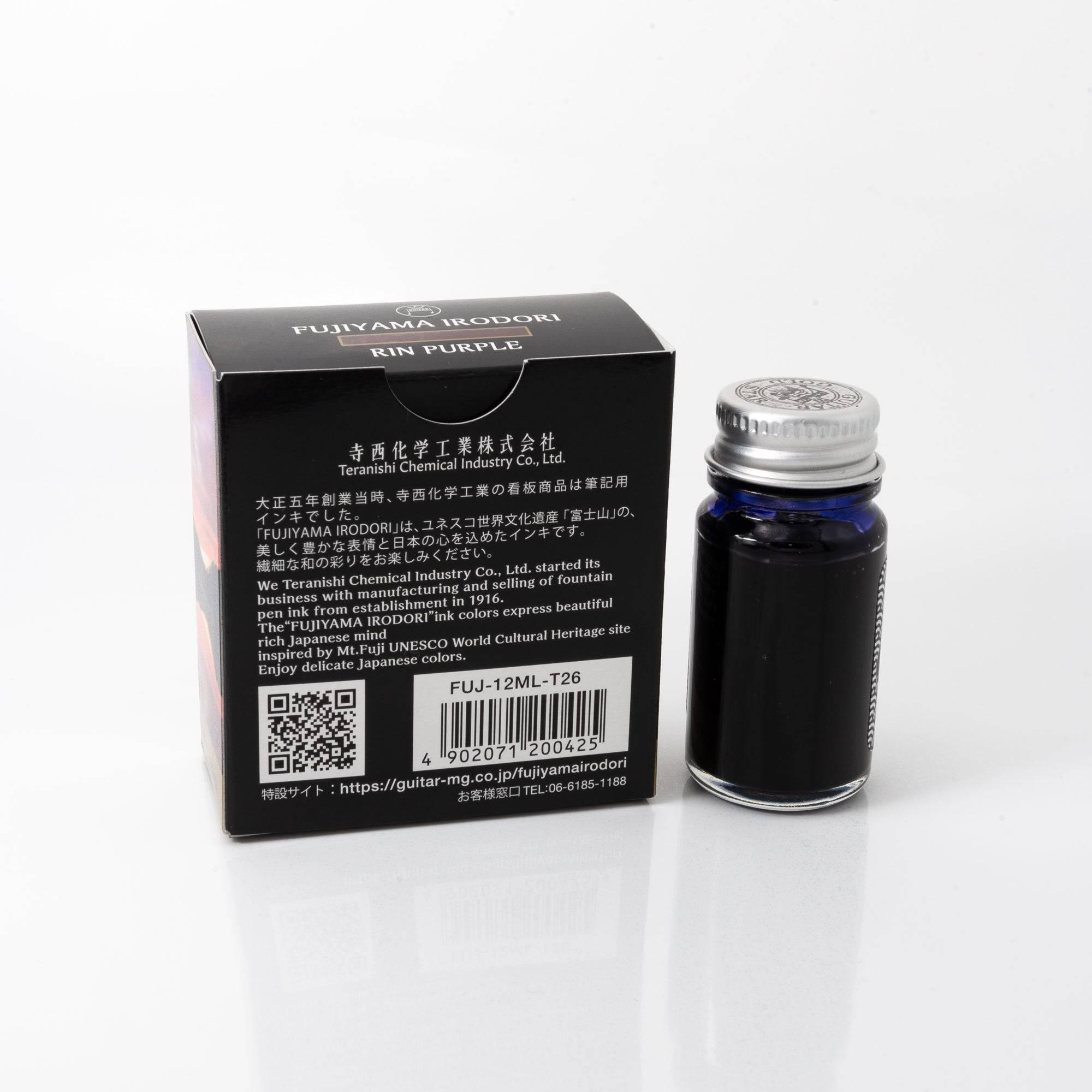 Fujiyama Irodori Rin fountain pen ink bottle with matching pen, emphasizing a cohesive and sophisticated design on a wooden desk.