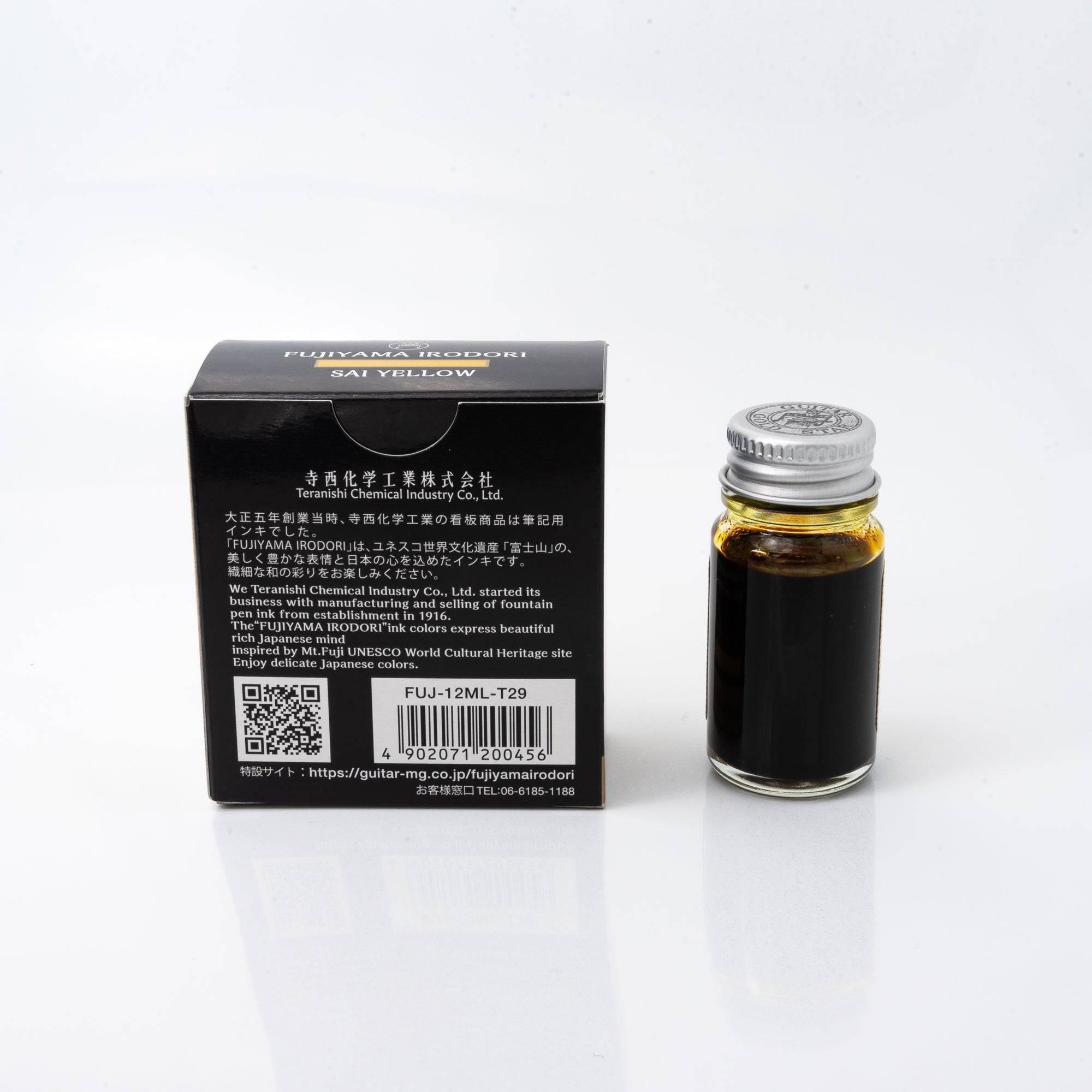 Fujiyama Irodori Sai fountain pen ink bottle and matching pen, arranged on a wooden desk, highlighting coordinated design.