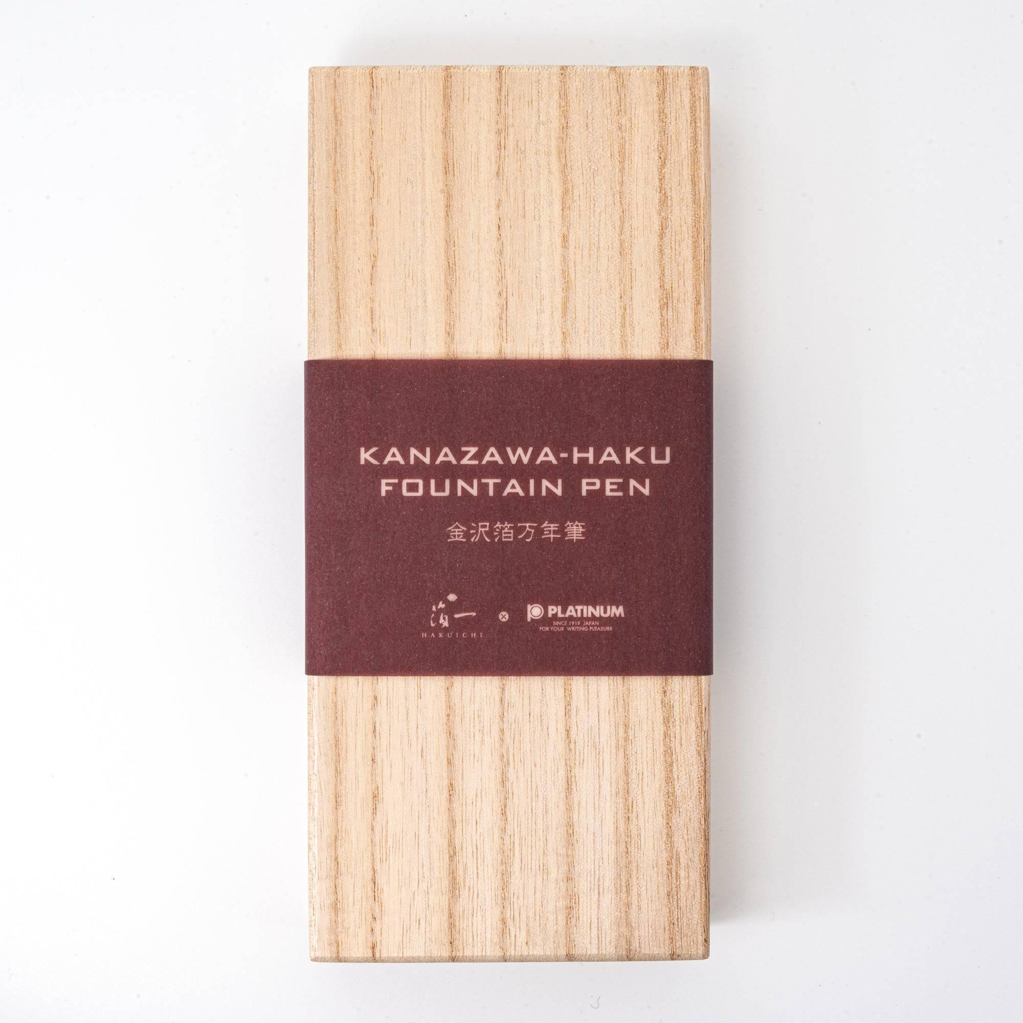 Close-up Gold Leaf Makie Sakura fountain pen displaying intricate pink sakura blossoms with black lacquer cap