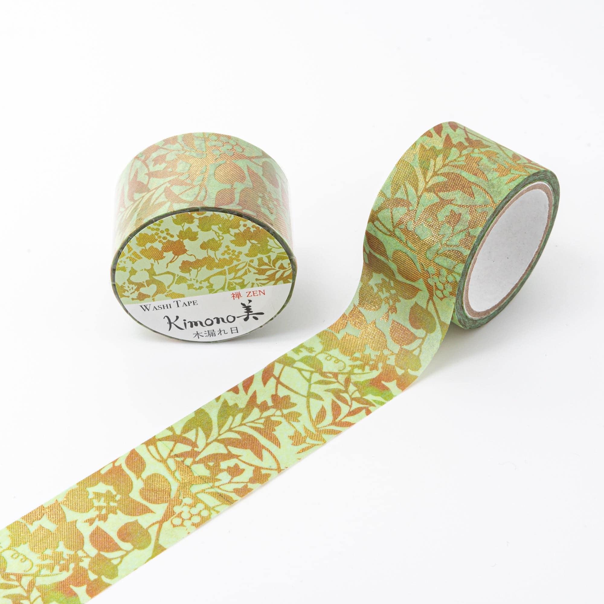 Iyo Washi Tape highlighting delicate Komorebi-inspired elements, gracefully arranged on a wooden surface for aesthetic appeal.