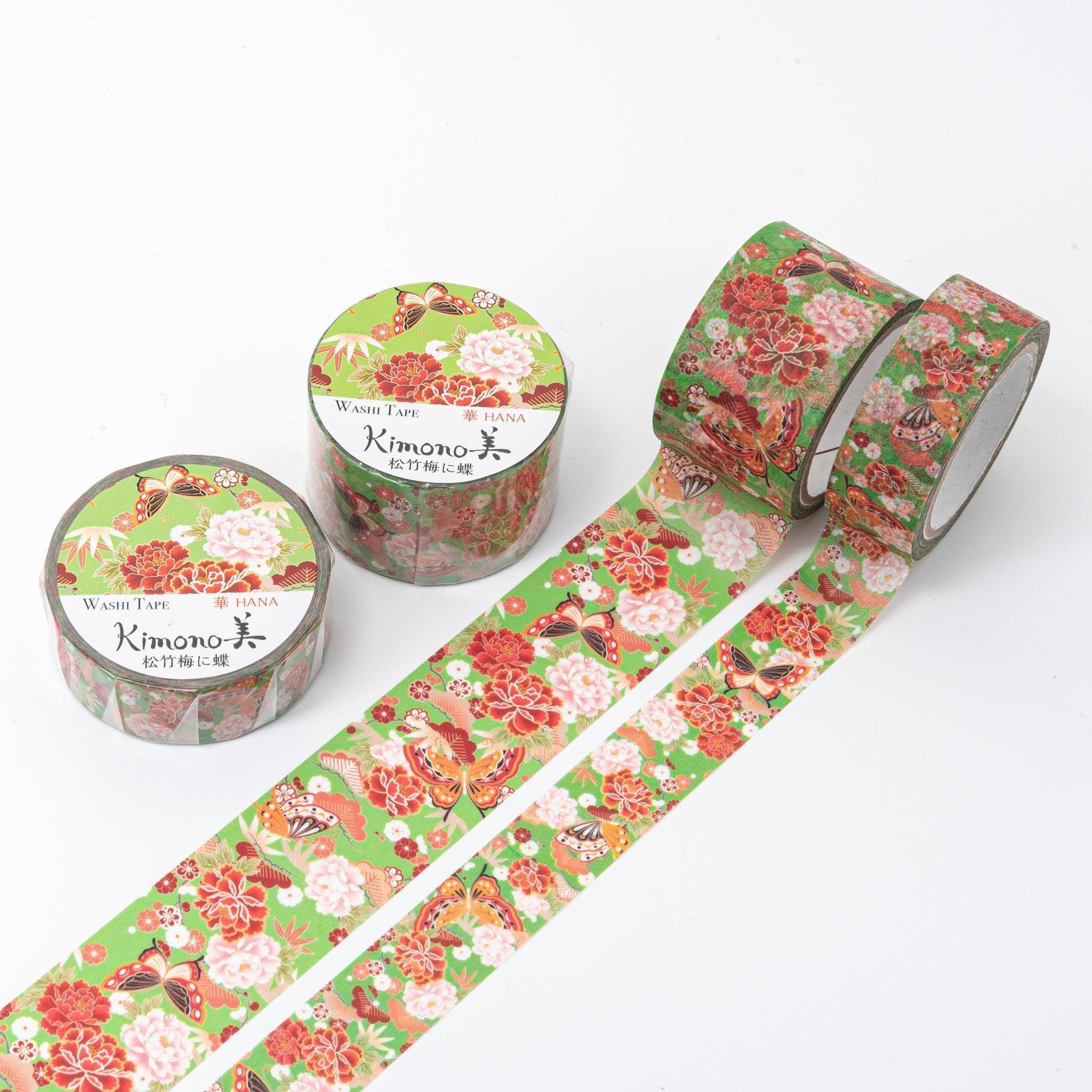 Kimono Beauty Series Iyo Washi Tape with pine, bamboo, and plum motifs alongside butterflies, arranged on a wooden surface.