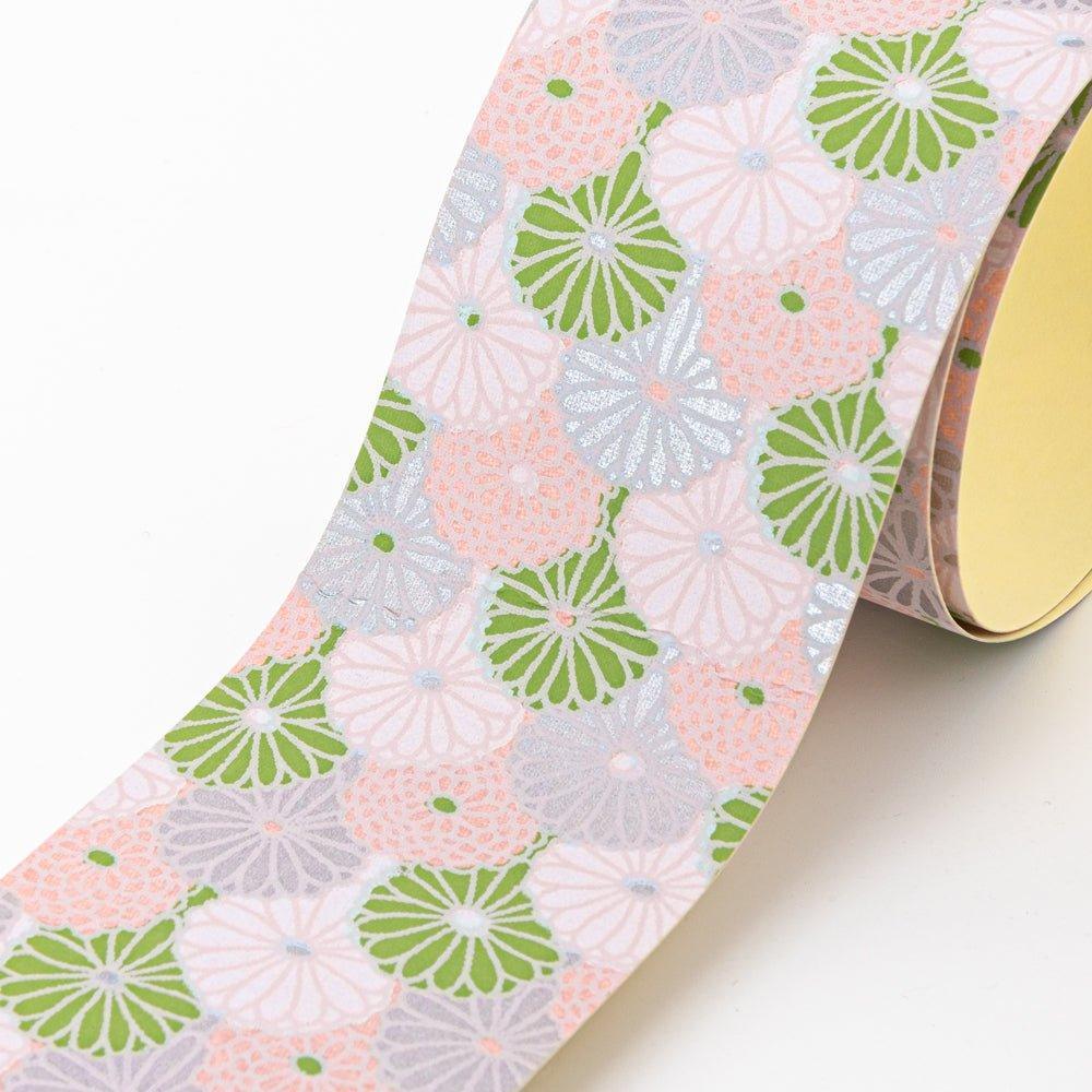 Close-up of Lavender Mist yuzen washi tape showing chrysanthemum flowers in green, pink, and lavender on pale background