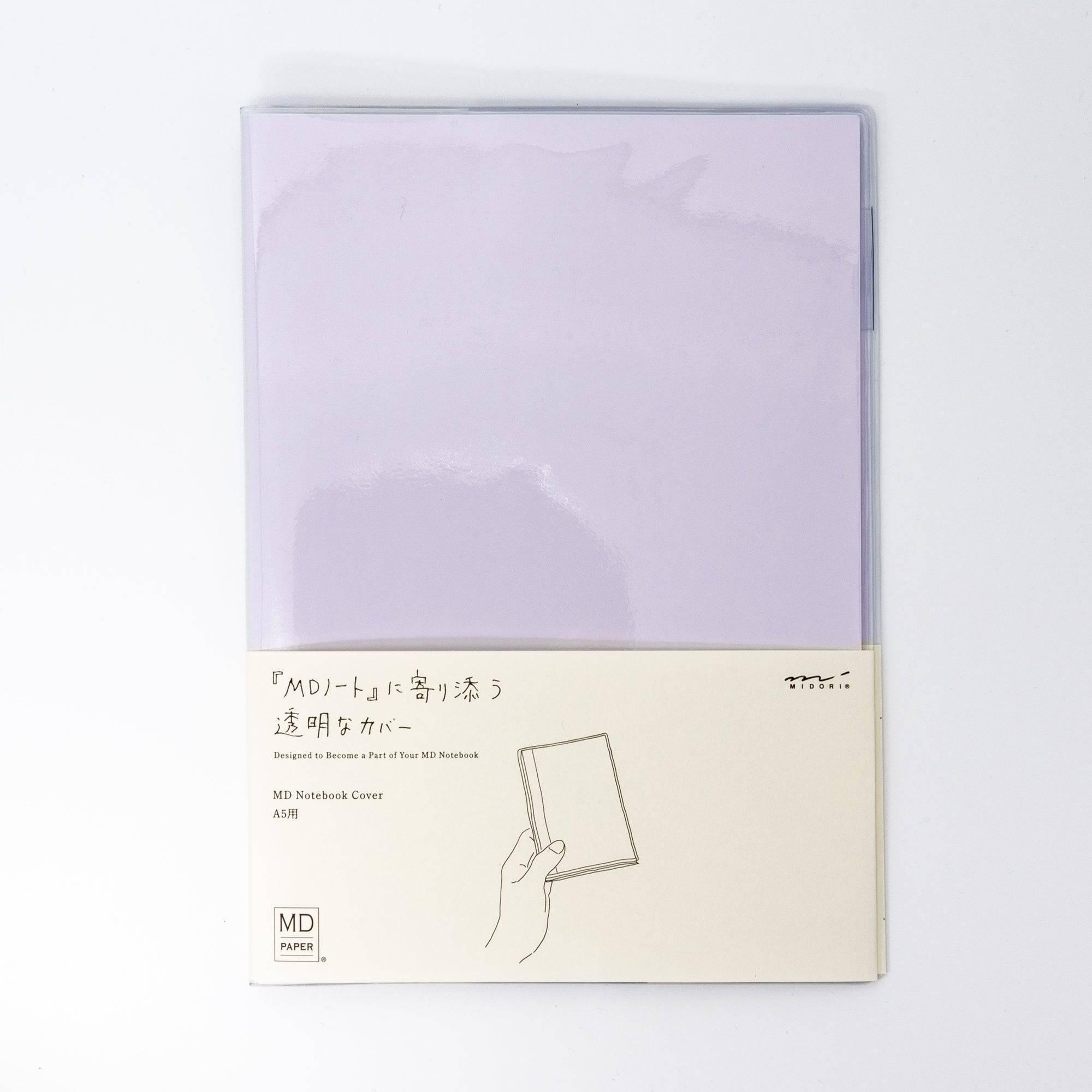 A transparent MD notebook cover in lavender, designed to protect and complement Japanese stationery notebooks.