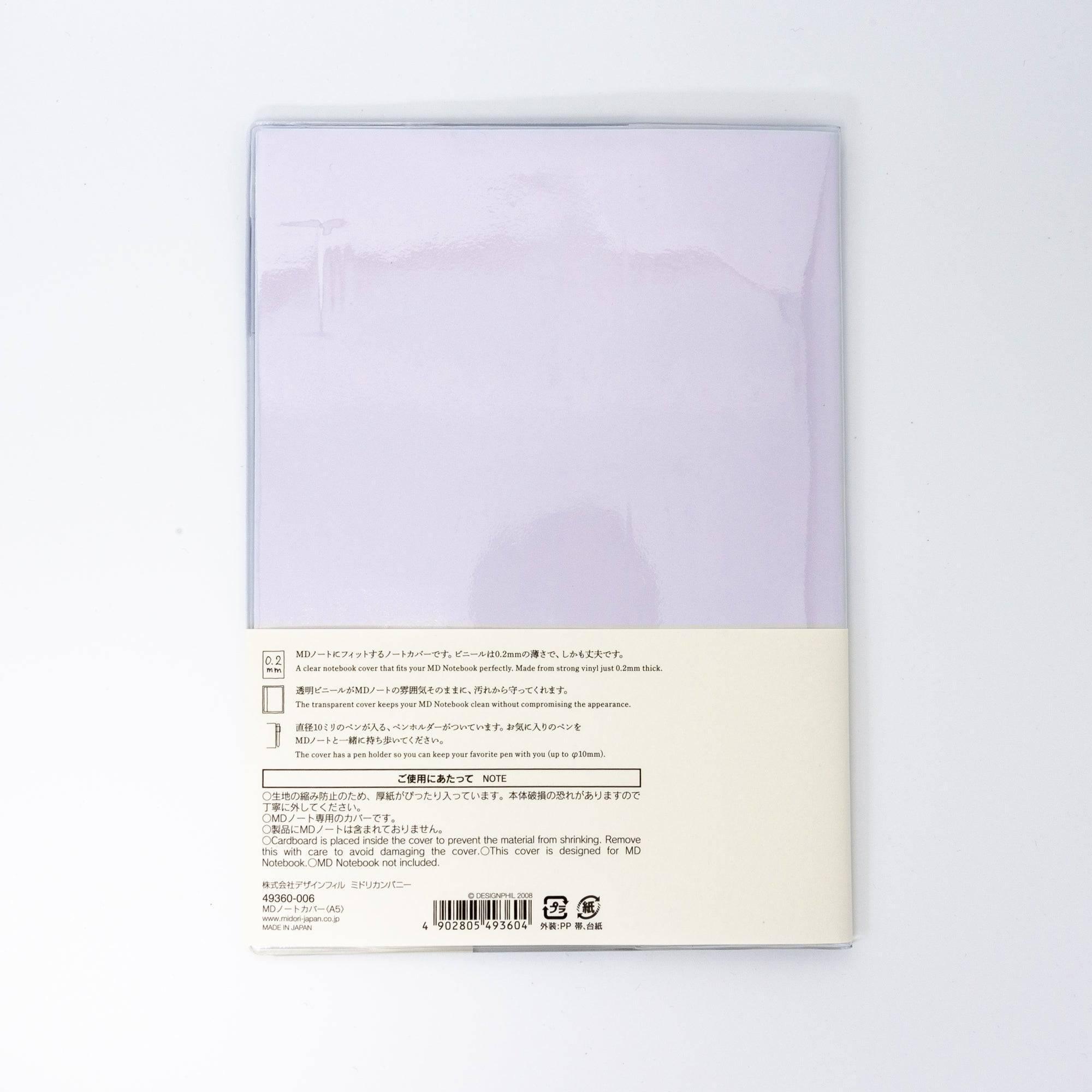 The back of an MD notebook cover in lavender, showing product details and branding as part of Japanese stationery.