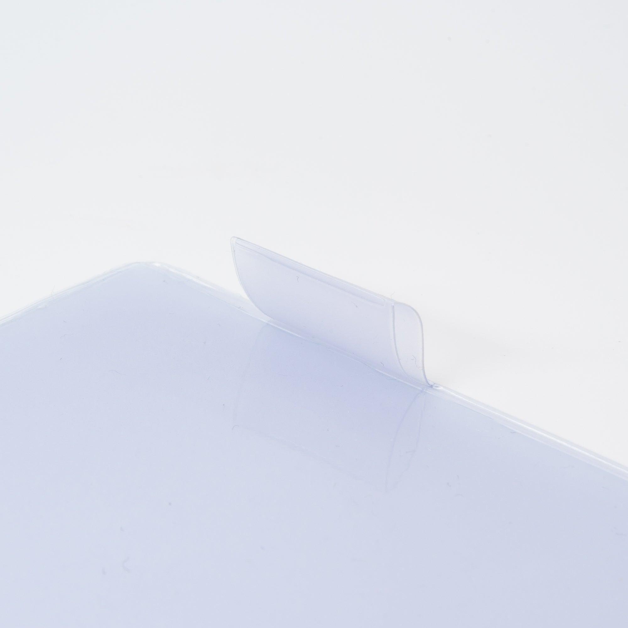 Close-up of the lavender MD notebook cover tab, showcasing its functionality as part of Japanese stationery.