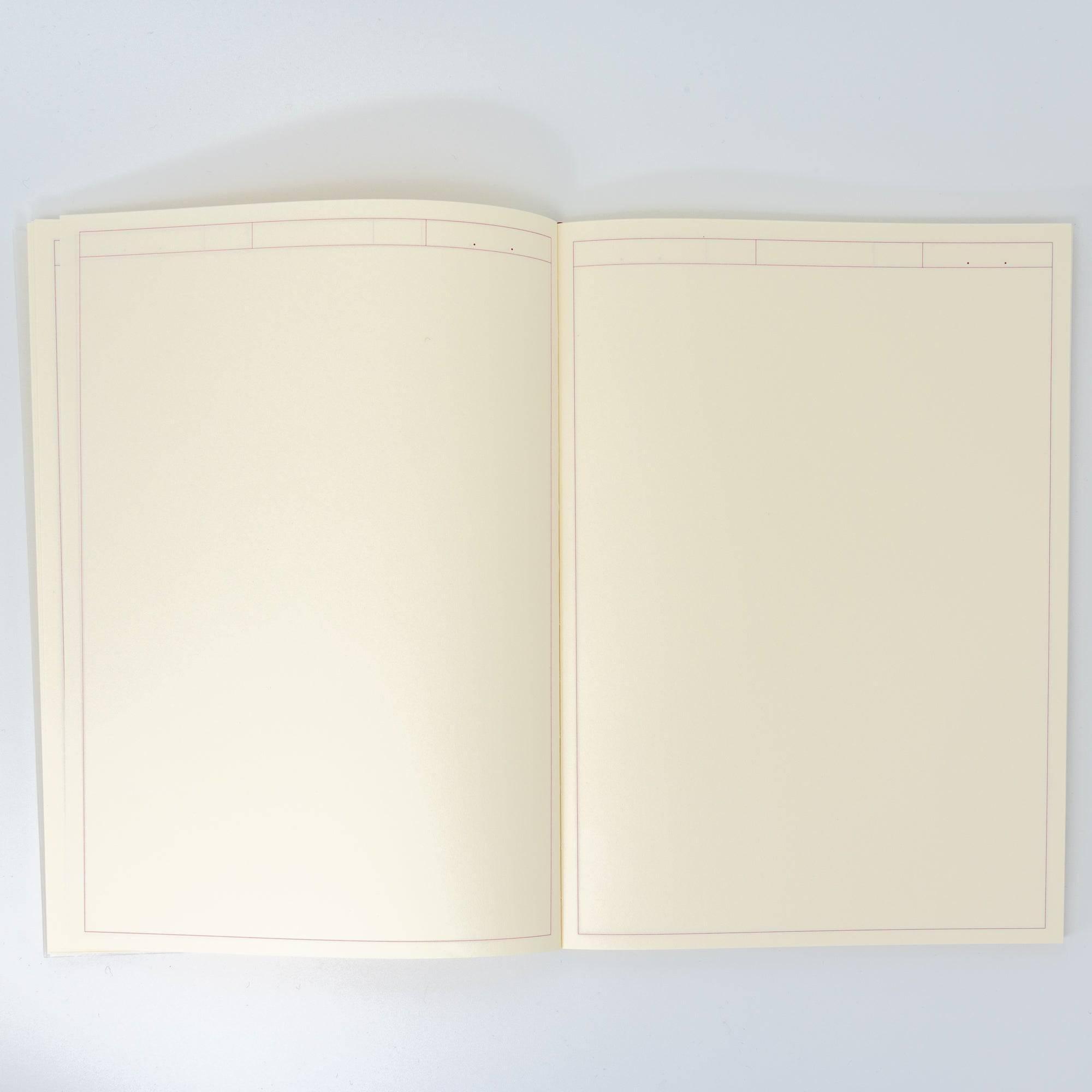 Interior pages of an MD notebook journal with a neat red frame layout, exemplifying Japanese stationery design.