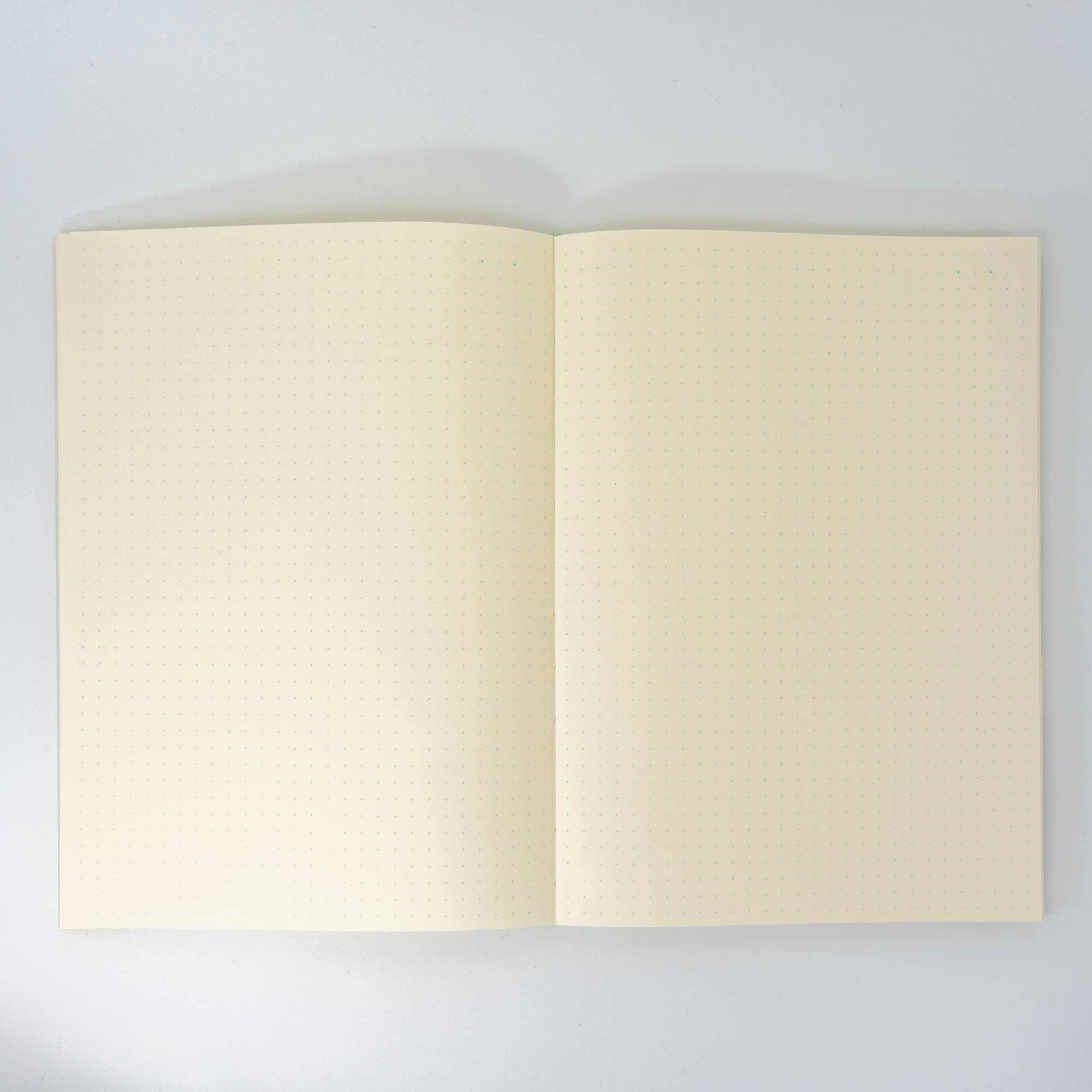 Interior pages of an MD notebook journal with a neat red frame layout, exemplifying Japanese stationery design.