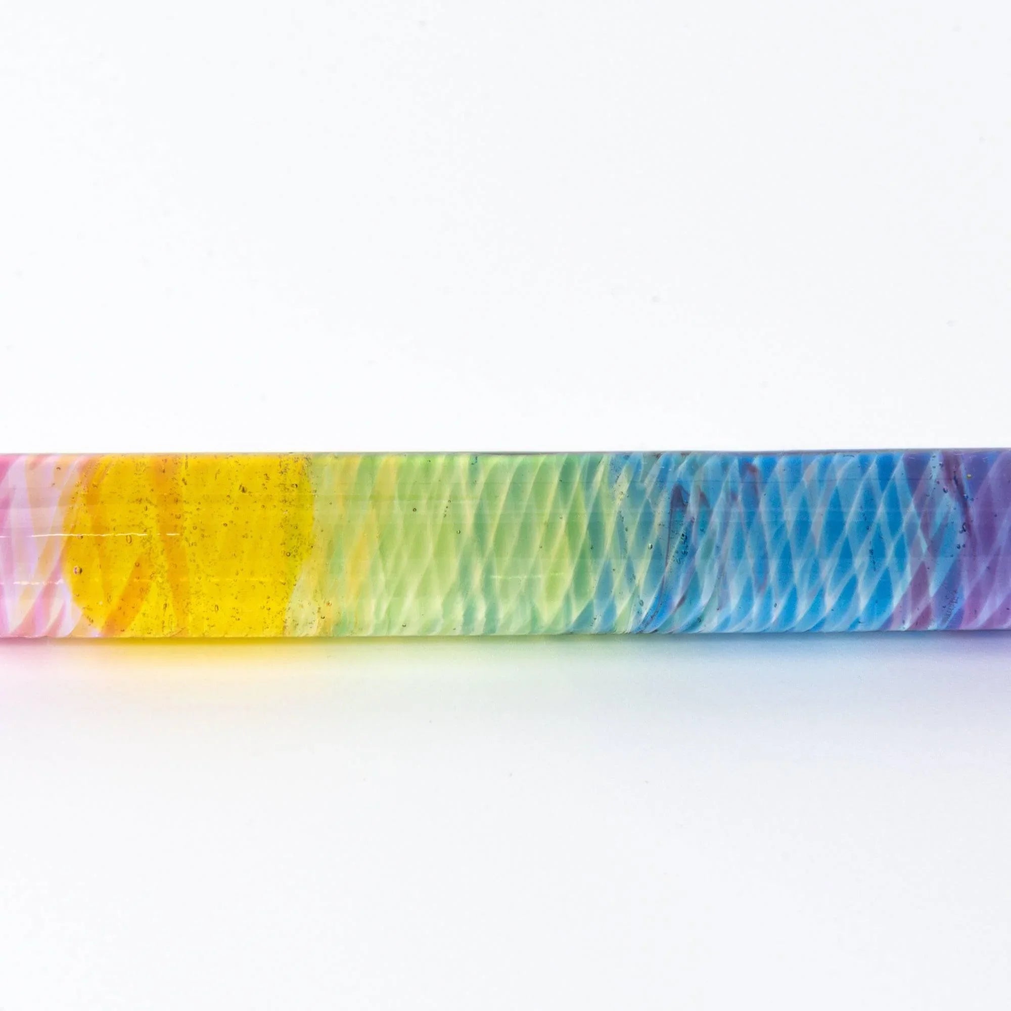 Rainbow Short glass dip pen handle close-up emphasizing horizontal ridge texture and vibrant rainbow color bands