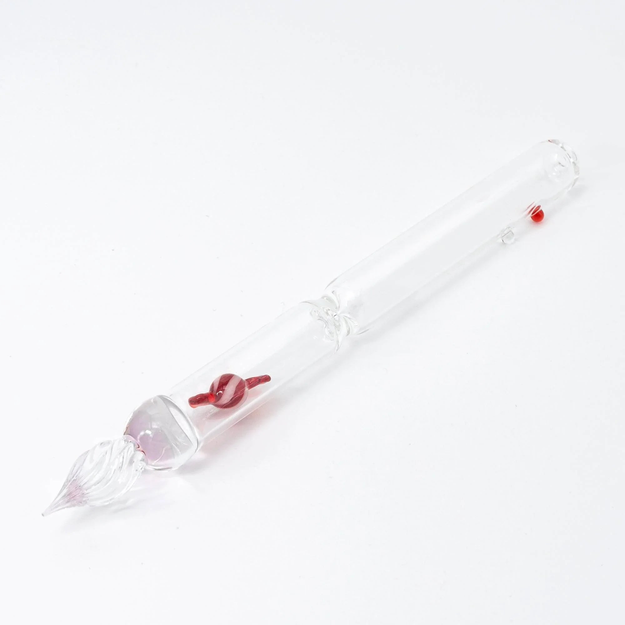 Red Candy Captured glass dip pen featuring vibrant crimson with candy bubble inclusions and twisted nib with holder