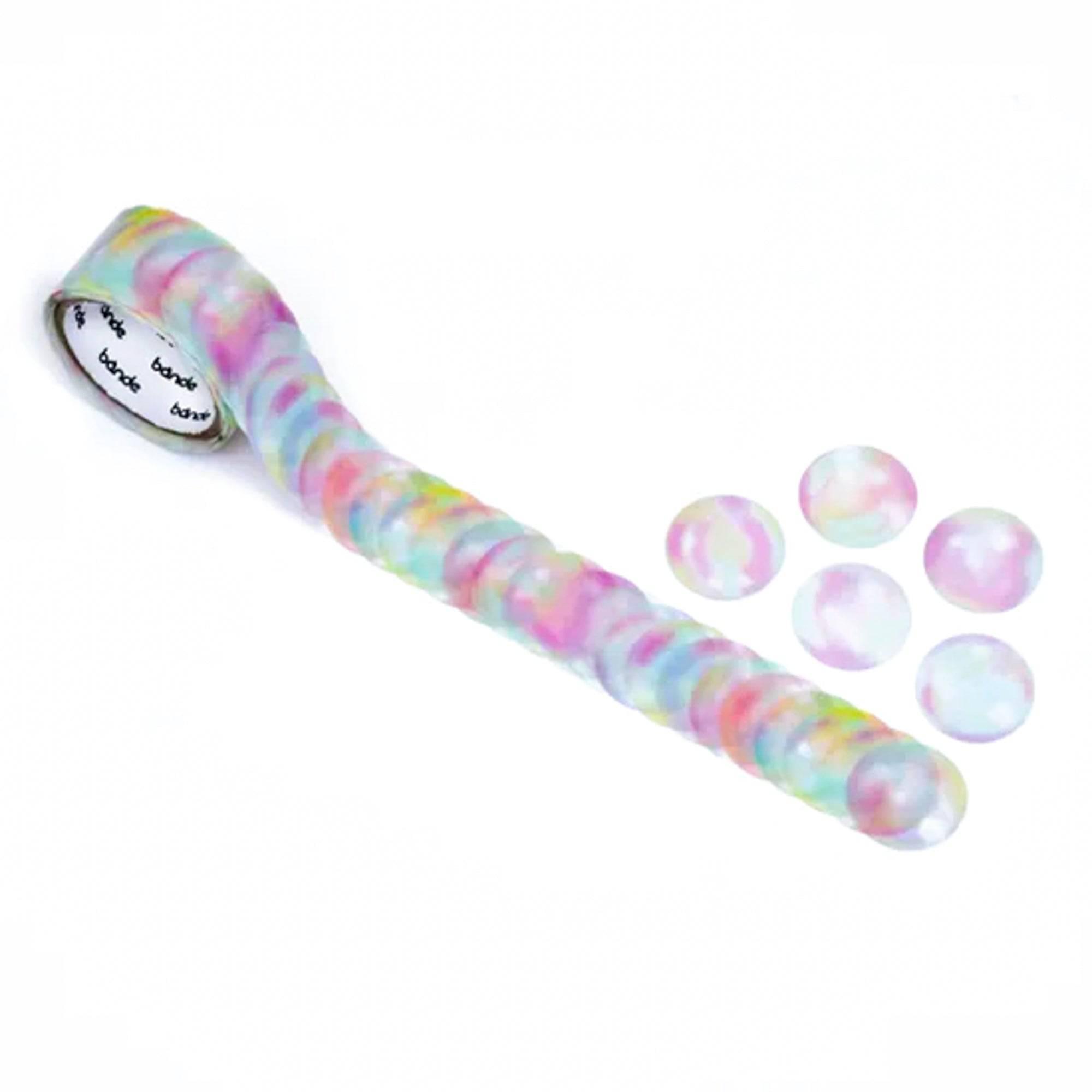 Soap Bubble Washi Tape Sticker Roll by Bande, featuring delicate bubble motifs, elegantly displayed on a wooden surface.