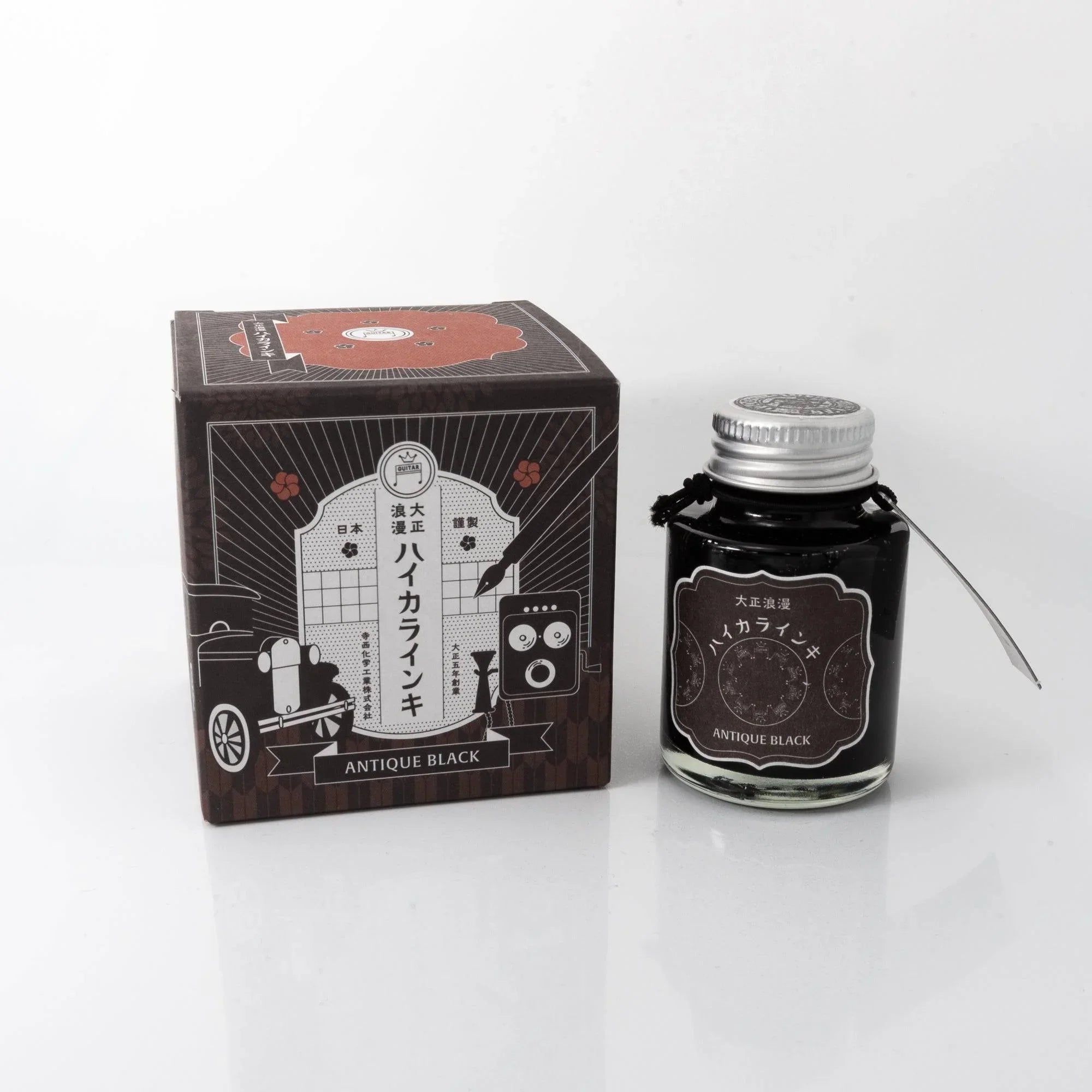 Taisho Romance Antique Black fountain pen ink bottle and decorative black box with damask pattern shown