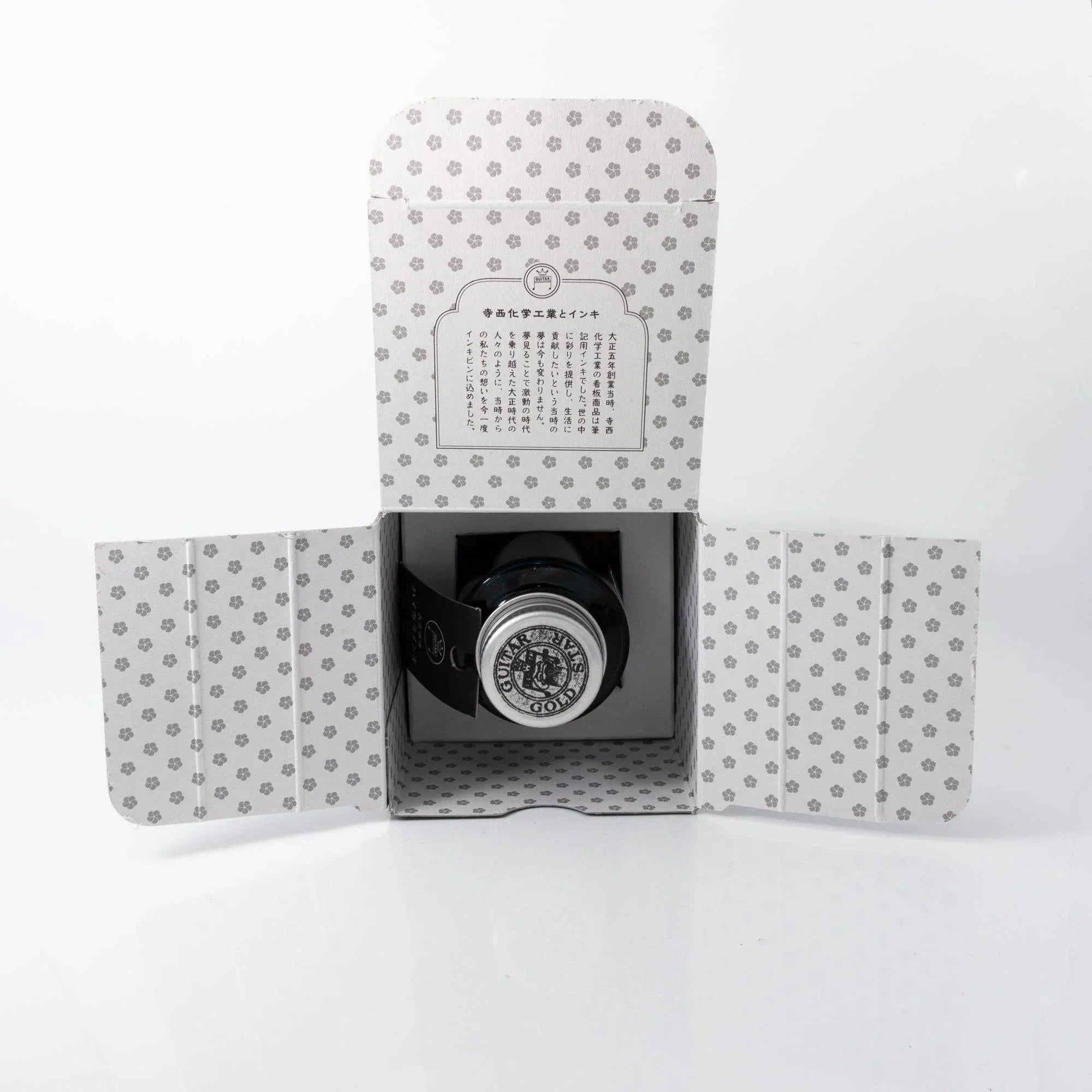 Taisho Romance fountain pen with Brilliant Mint Japanese ink displayed in lifestyle flat lay shot setting