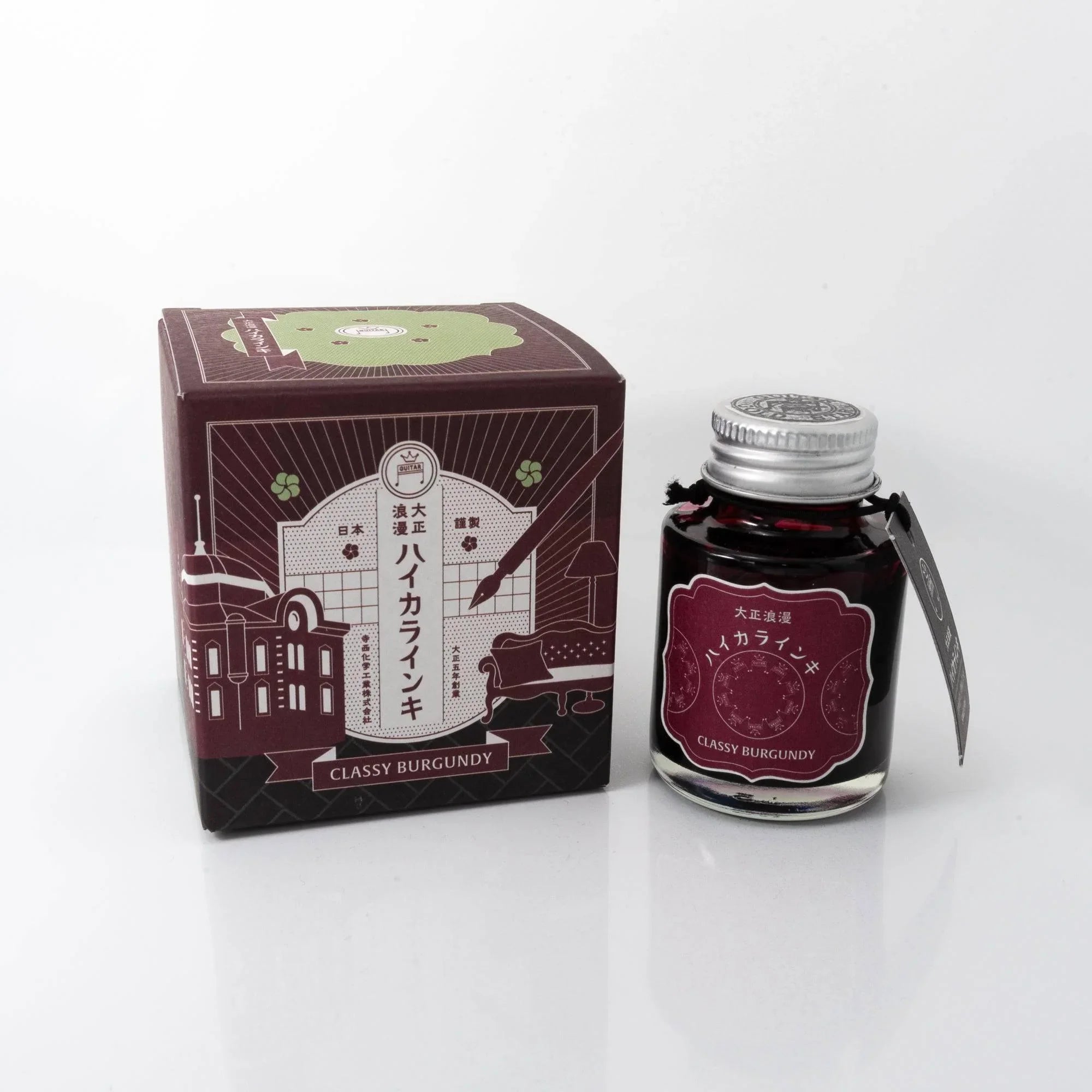 Taisho Romance Classy Burgundy fountain pen ink bottle and black box with burgundy accents displayed