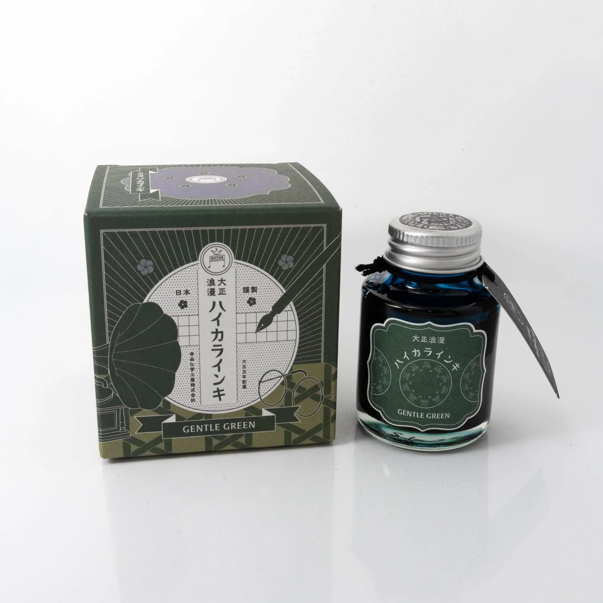 Taisho Romance Gentle Green fountain pen ink 50ml glass bottle in professional product photography display setup