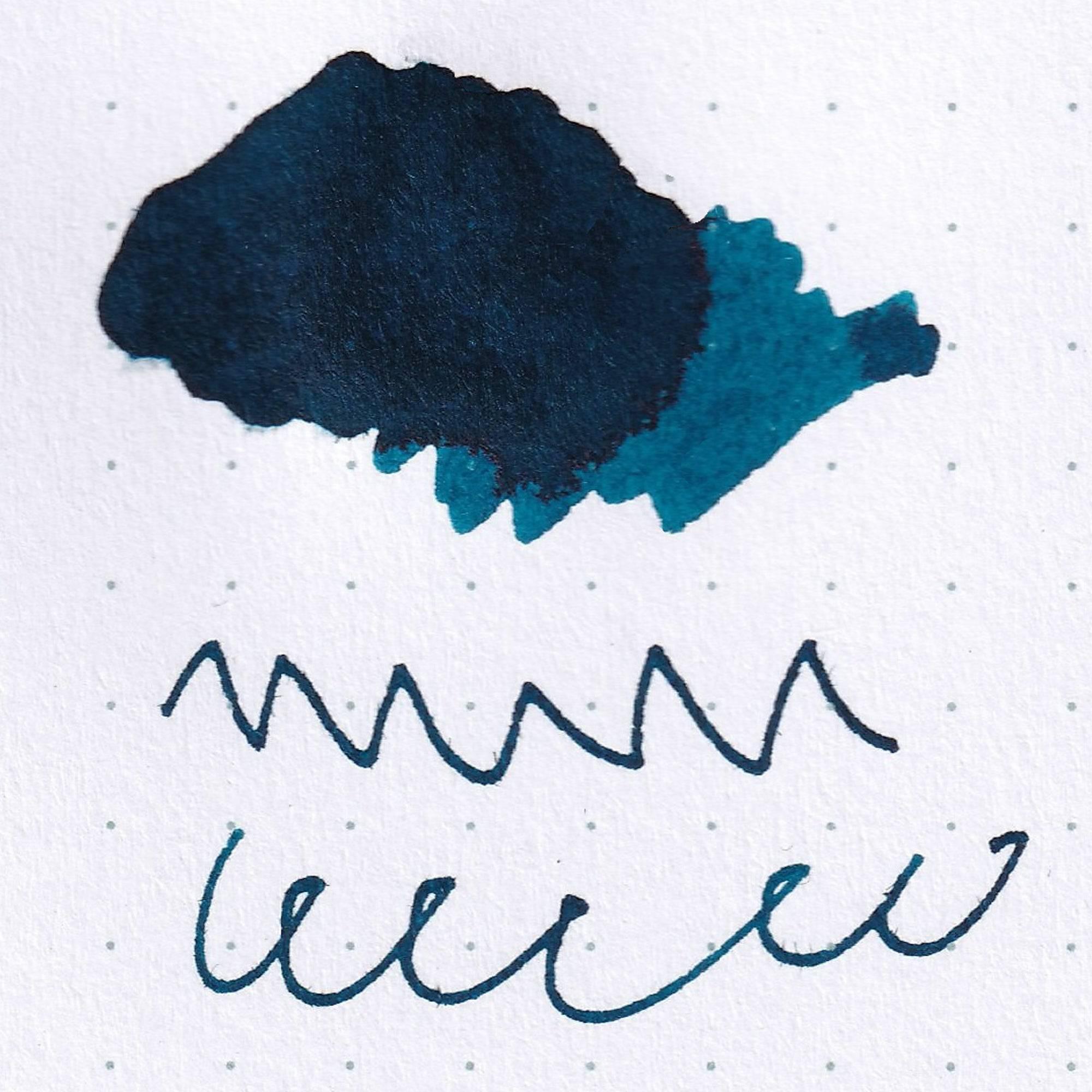 Close-up of Taisho Romance Melancholic Blue ink bottle, highlighting its rich blue ink and vintage-inspired label design.