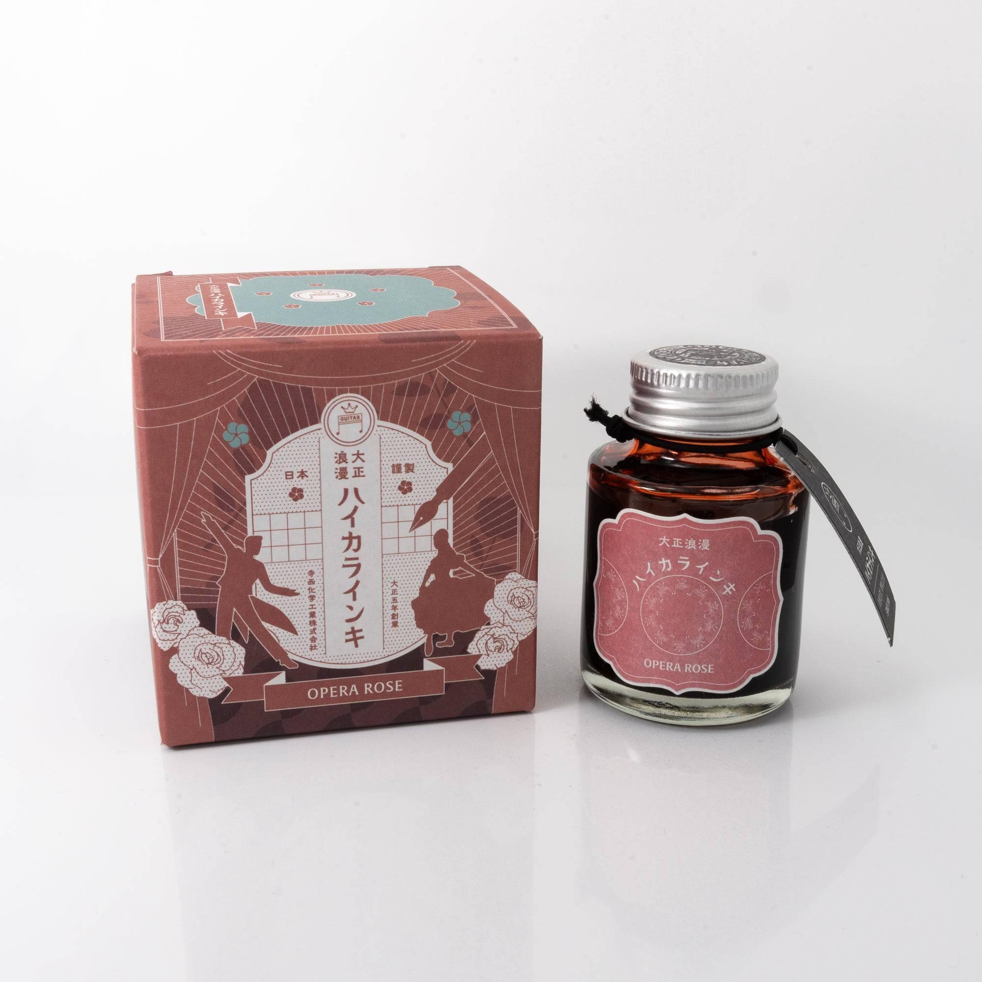 A bottle of red-toned ink "OPERA ROSE" with its retro-style packaging, a piece of Japanese stationery.