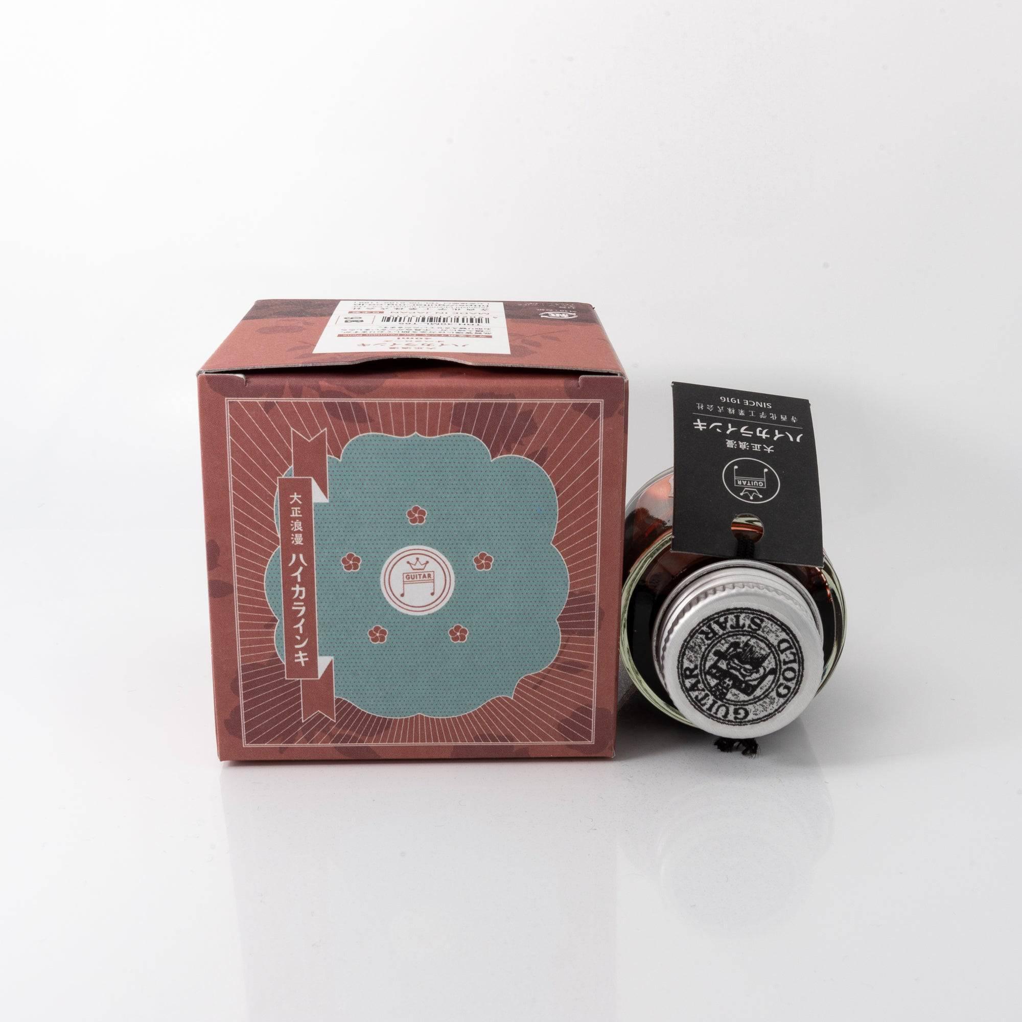 The "OPERA ROSE" ink box and bottle top, showcasing elegant Japanese stationery design with retro aesthetics.