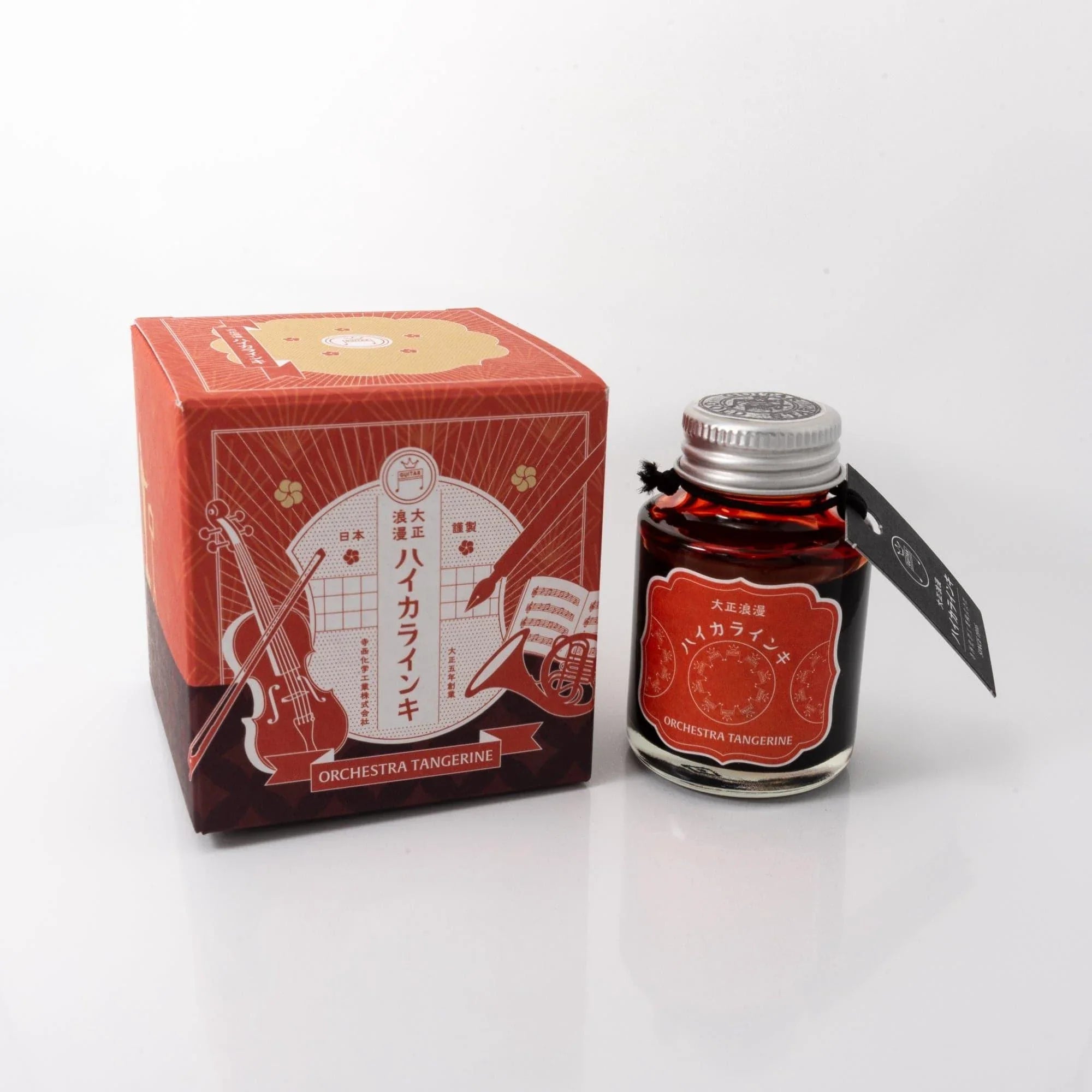 Taisho Romance Orchestra Tangerine fountain pen ink bottle with art nouveau label on white background display